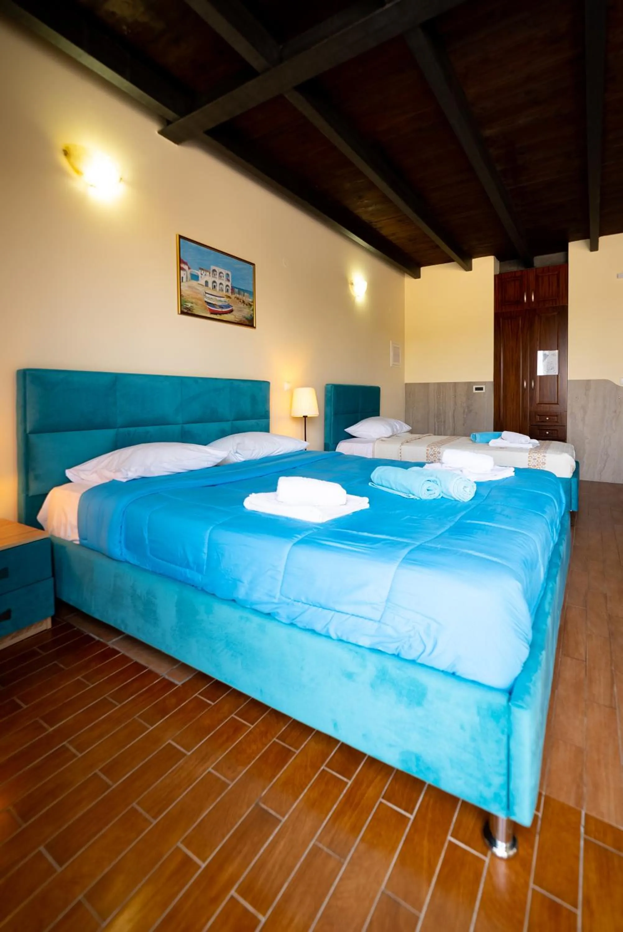 Bed in Ornella Beach Resort & Villas