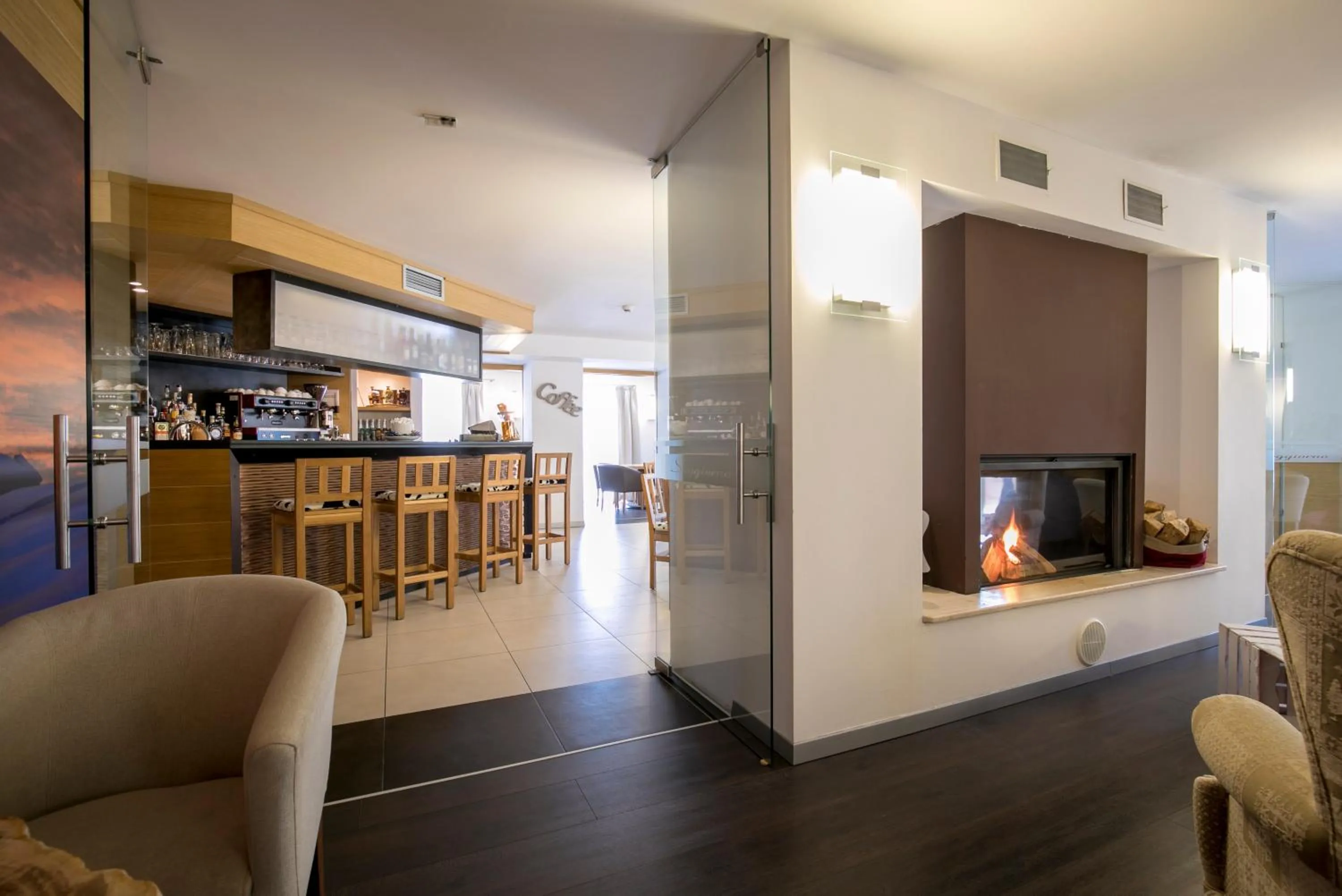 Communal lounge/ TV room in Hotel Luna Bianca Folgaria