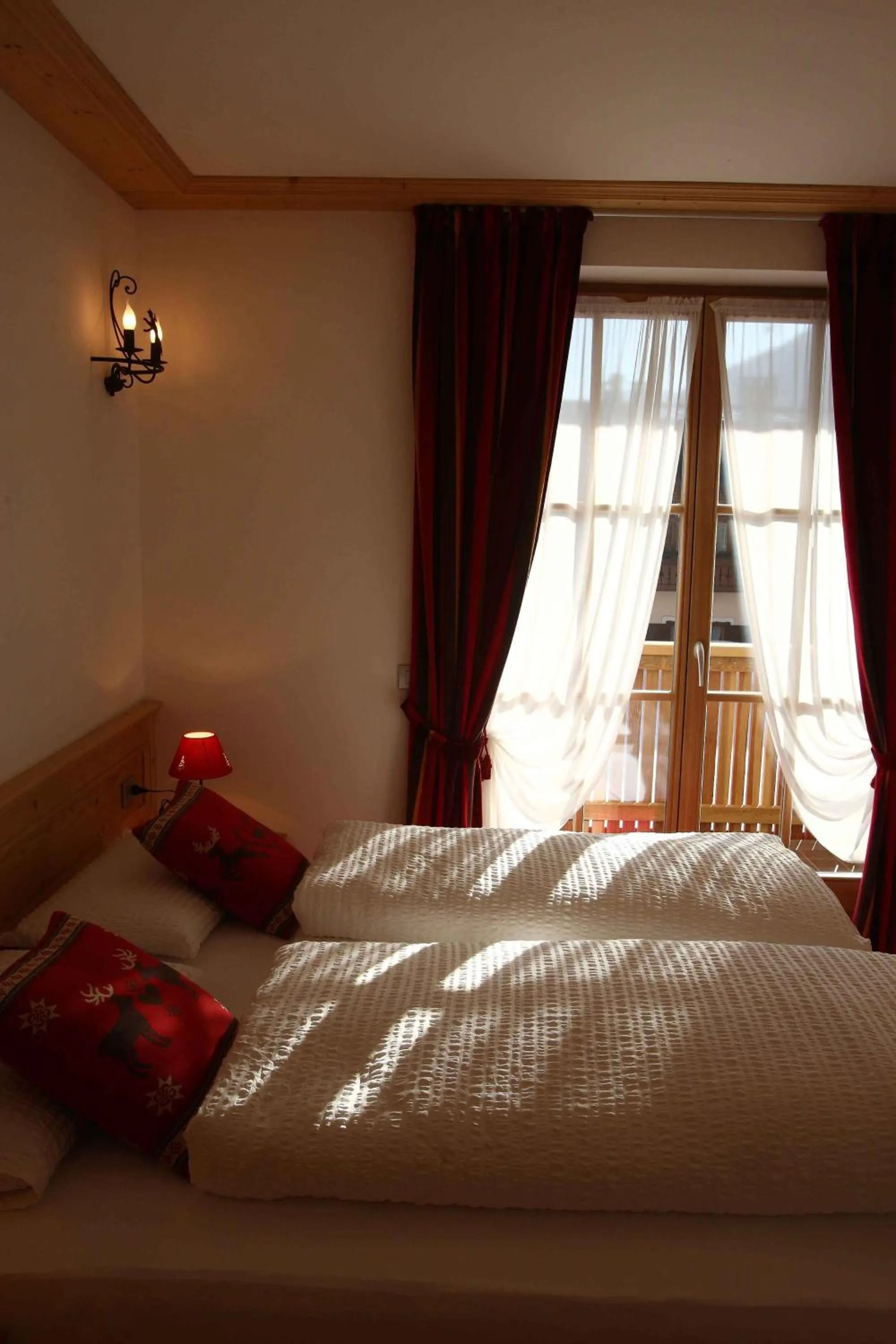 Decorative detail, Bed in Apartments Sol E Nef