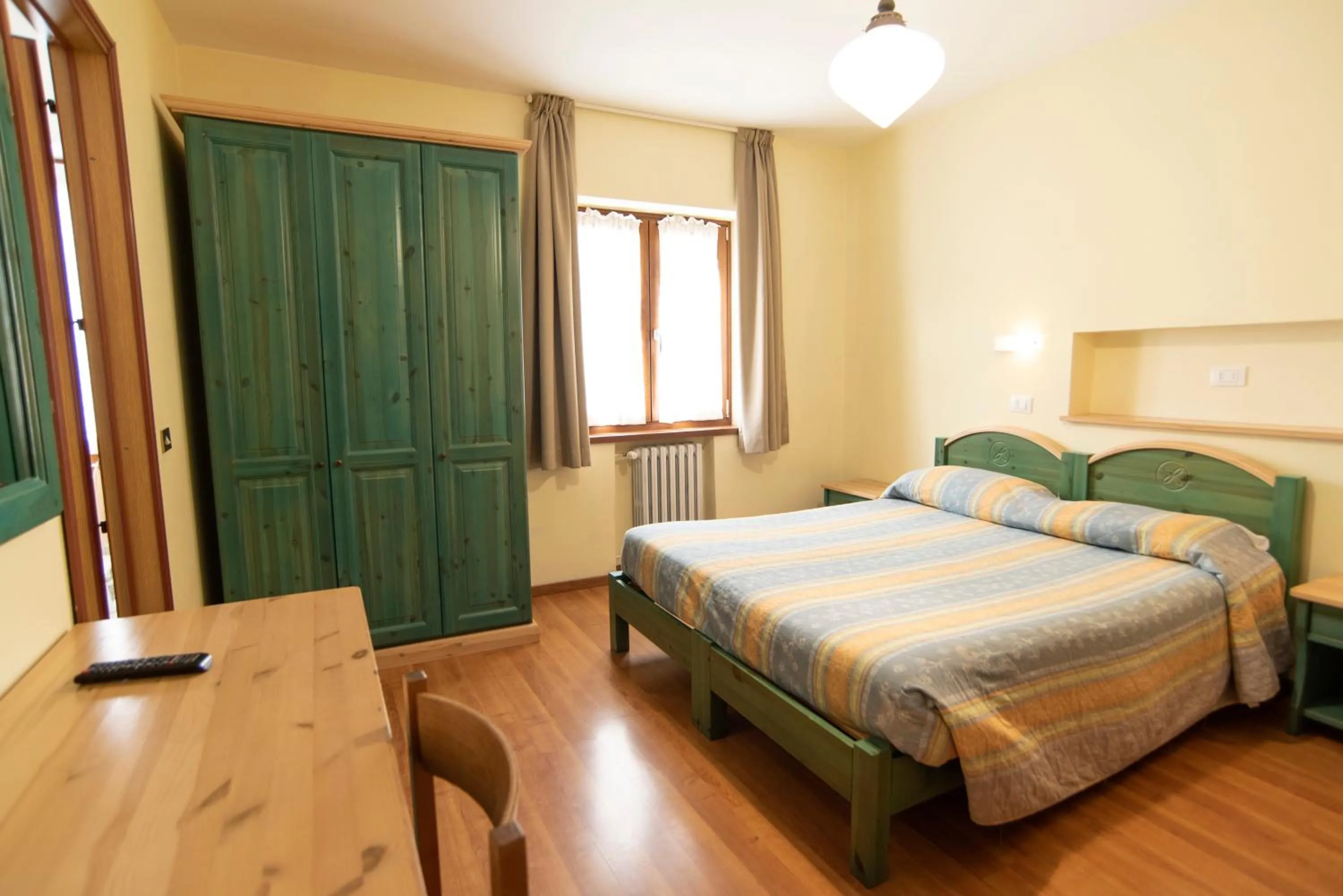 Bed in Albergo Bucaneve