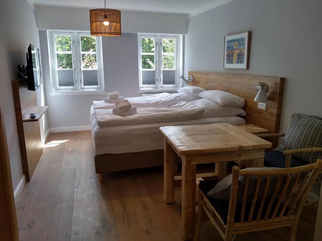 Photo of the whole room, Bed in Tetens Gasthof