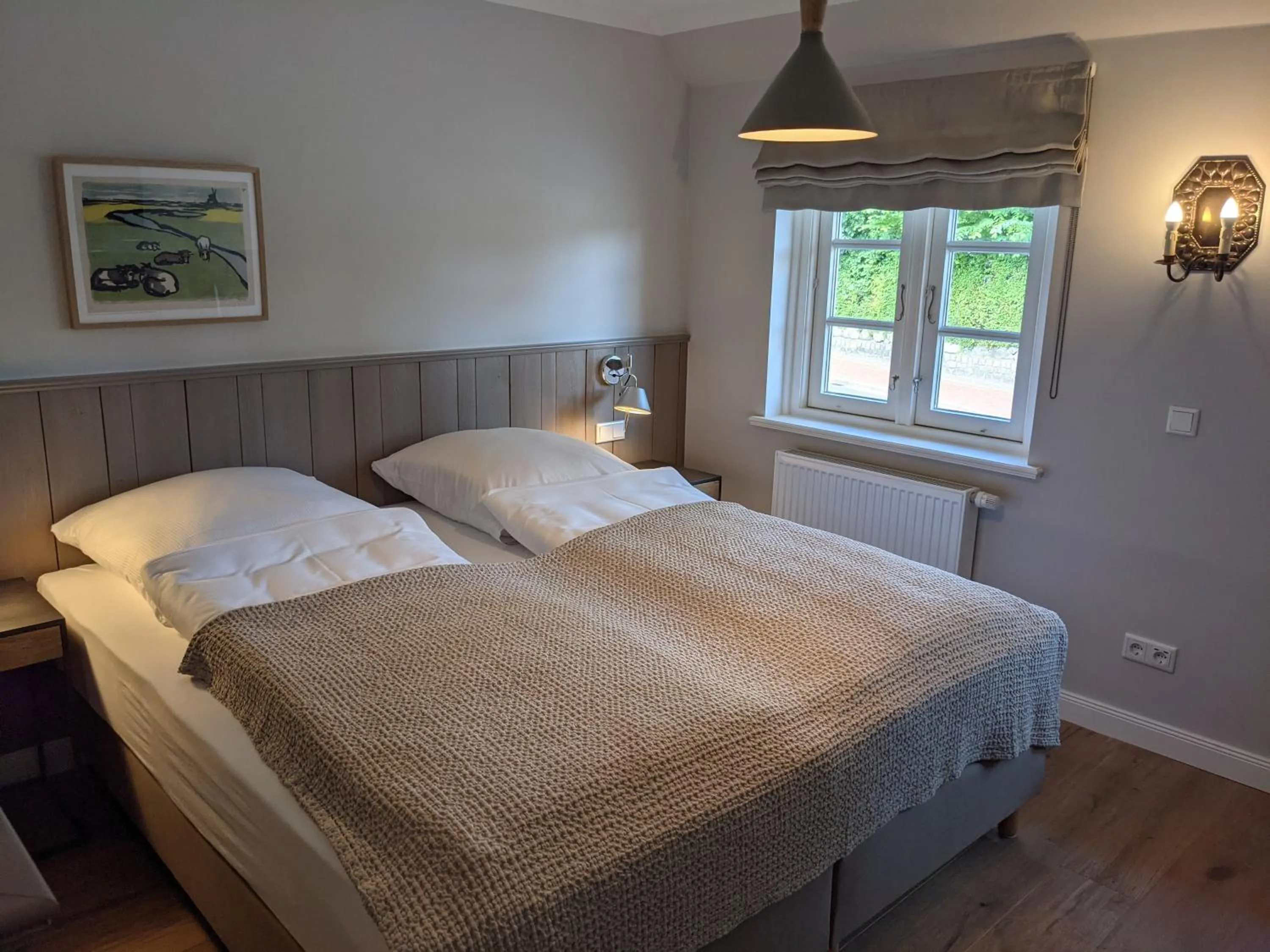Photo of the whole room, Bed in Tetens Gasthof