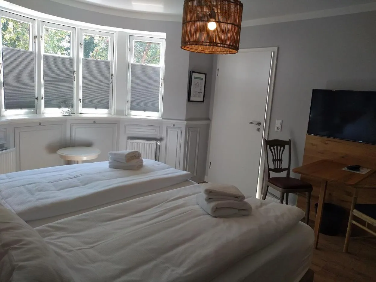 Photo of the whole room, Bed in Tetens Gasthof