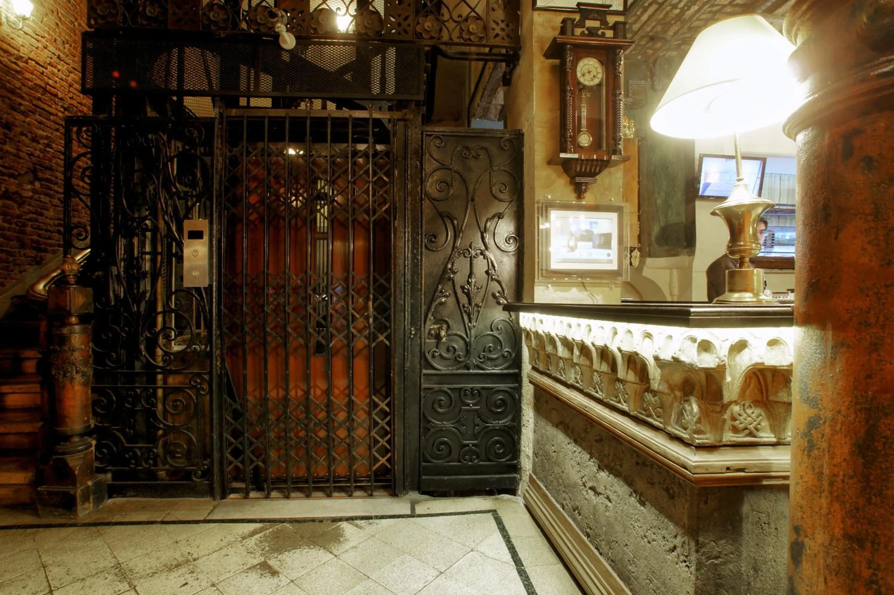 Lobby or reception in La Fresque Hotel