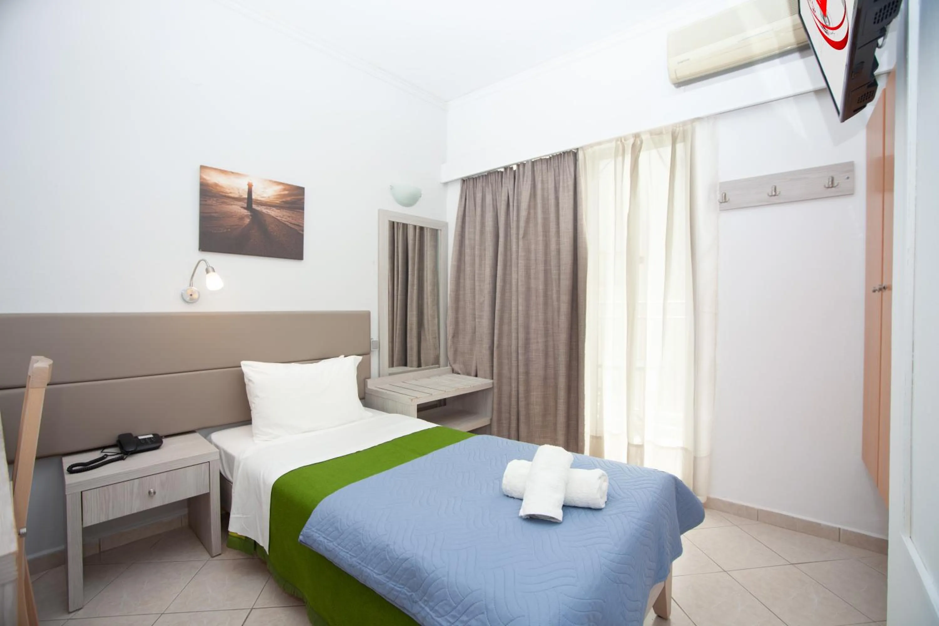 Bed in Aristea Hotel