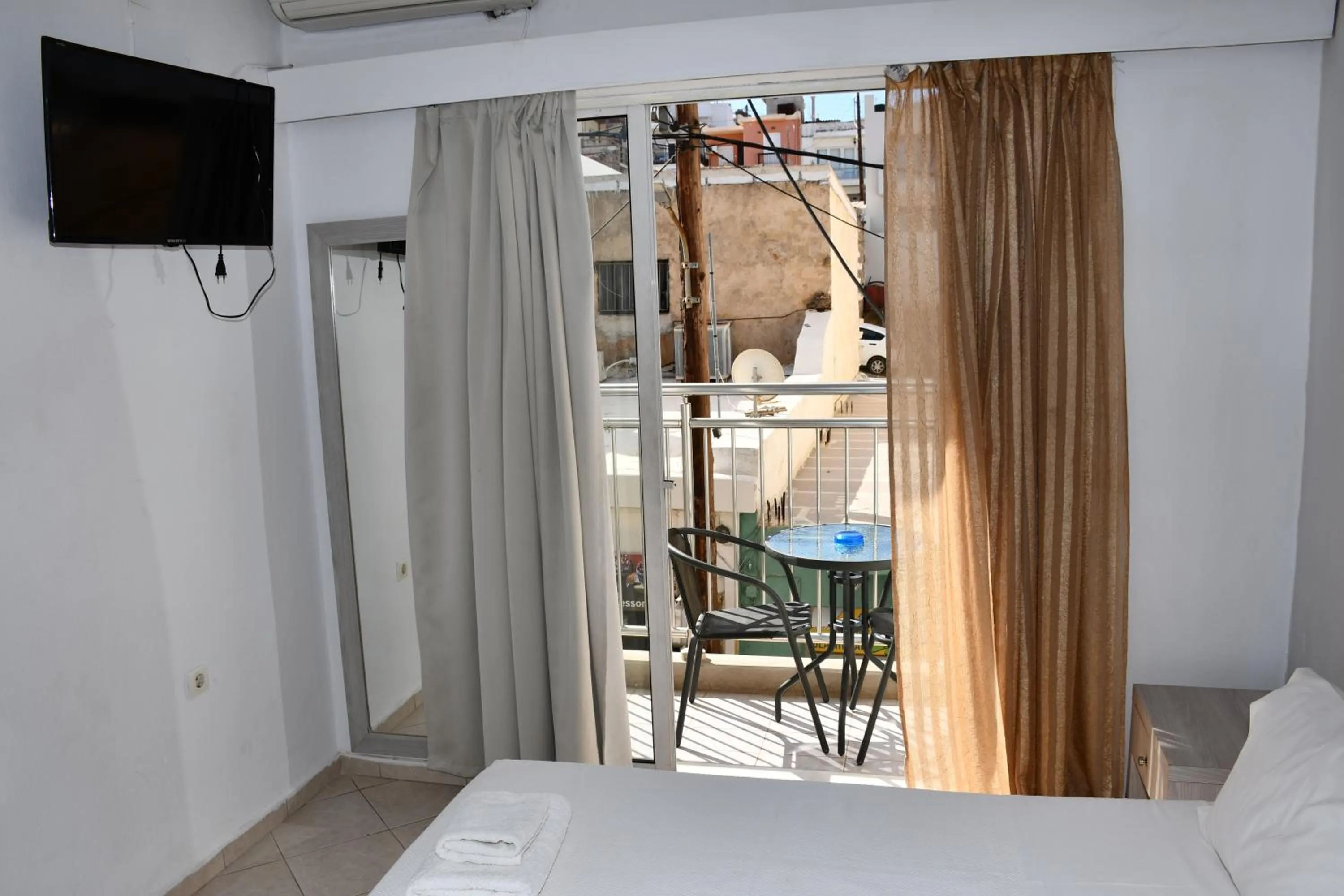 Bed in Aristea Hotel