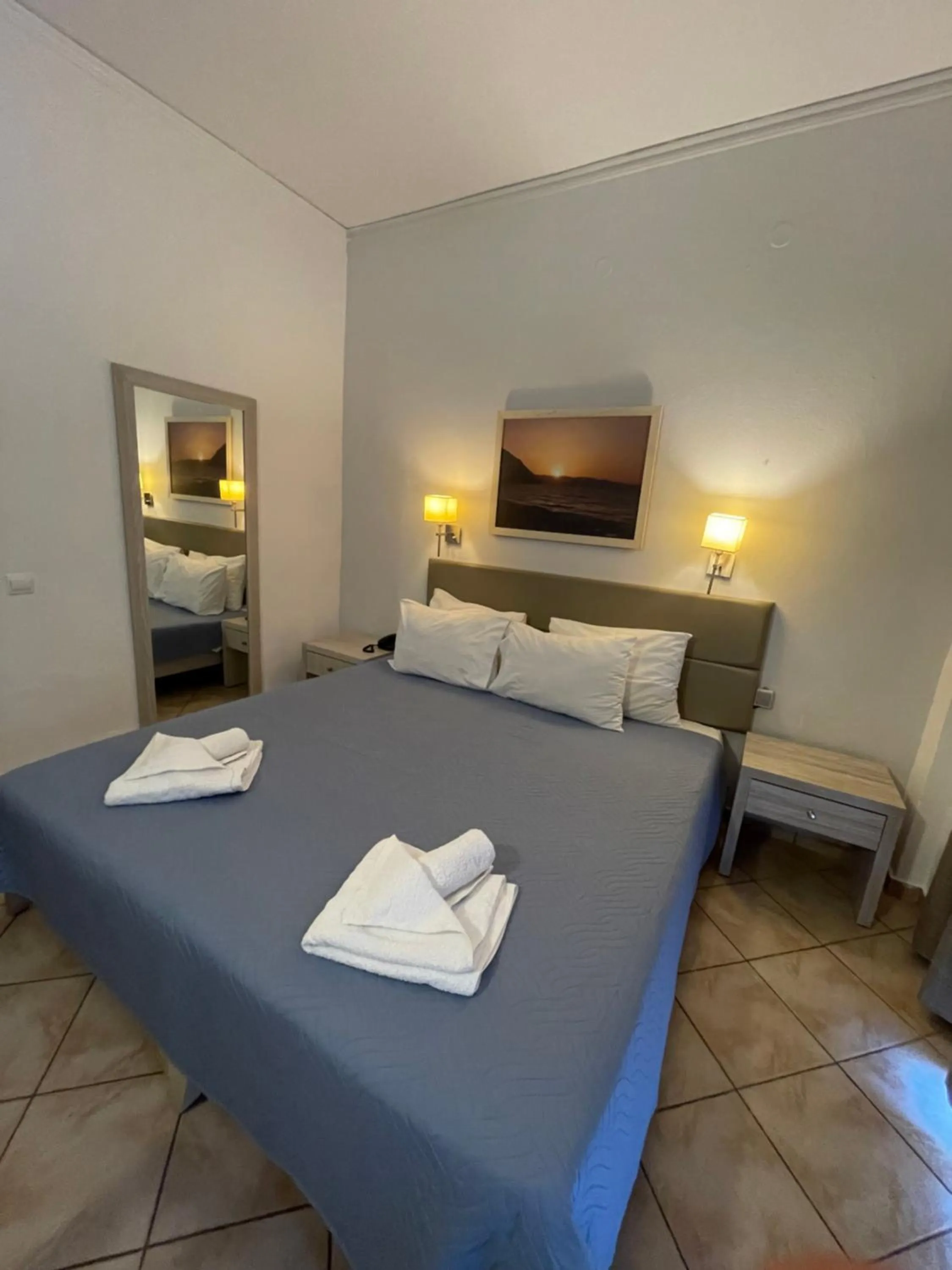 Bed in Aristea Hotel