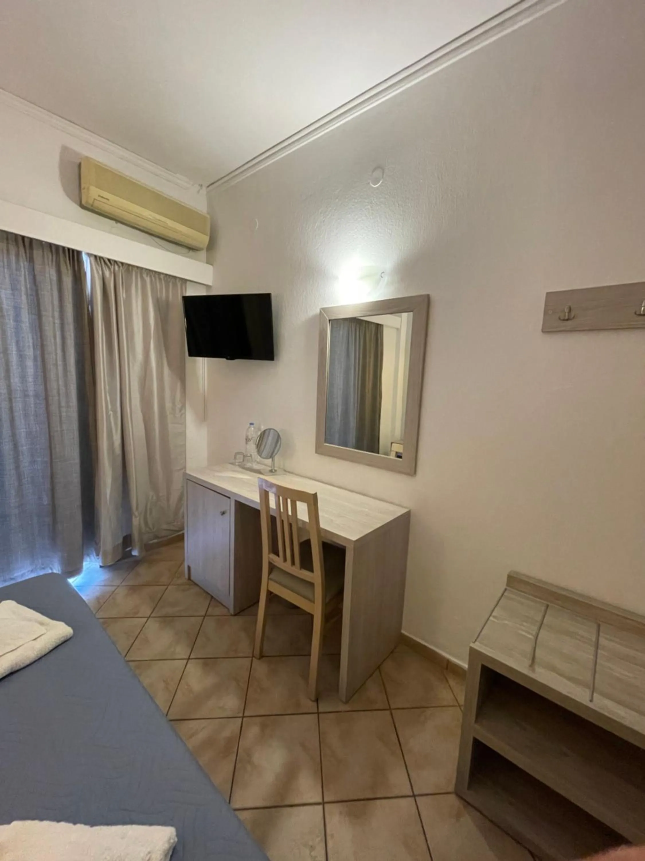 Bed in Aristea Hotel