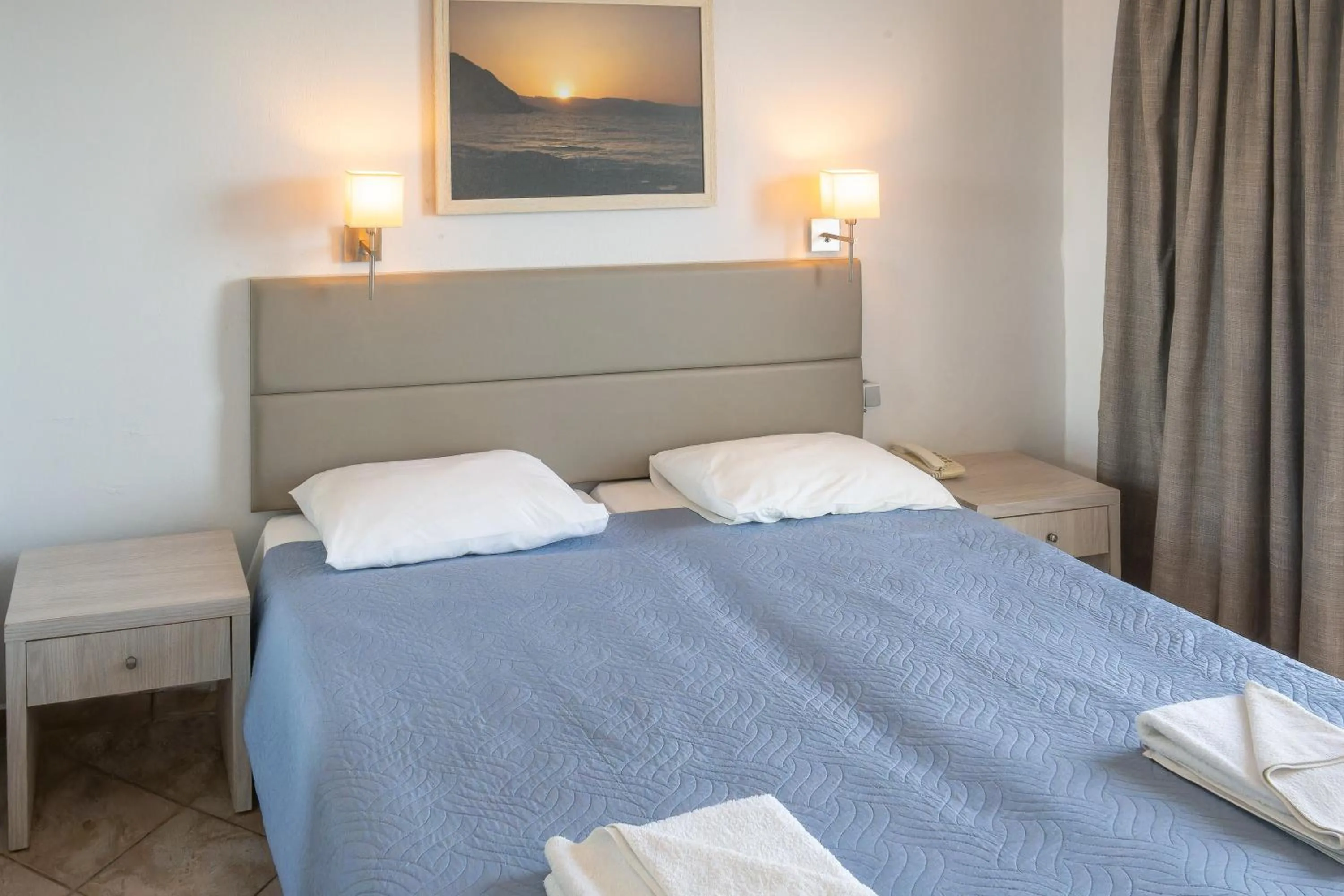 Bed in Aristea Hotel