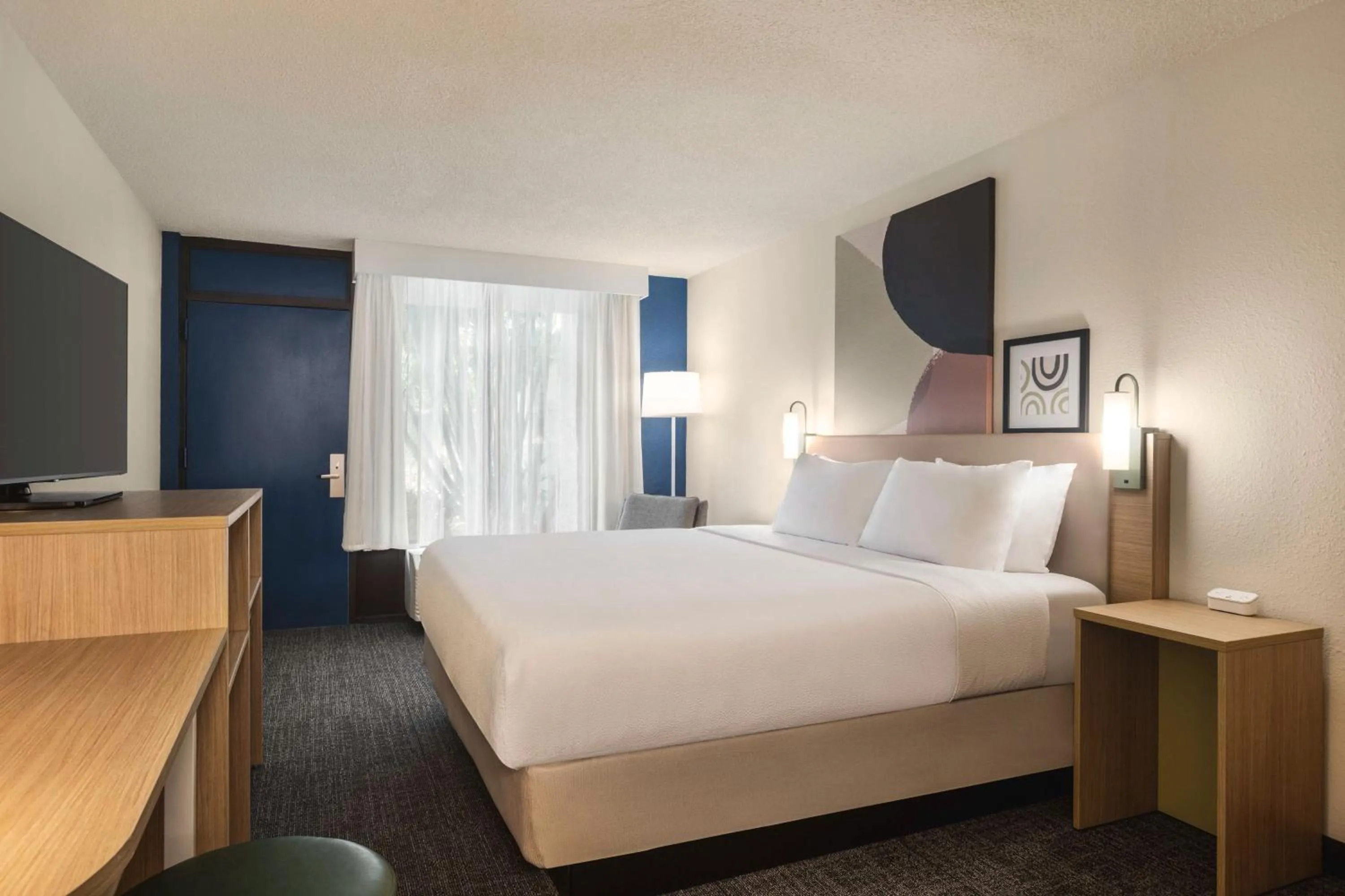 Bed in Spark by Hilton Sarasota Siesta Key Gateway