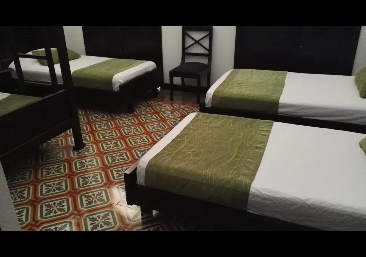 Decorative detail, Bed in Casa Escobar Buga