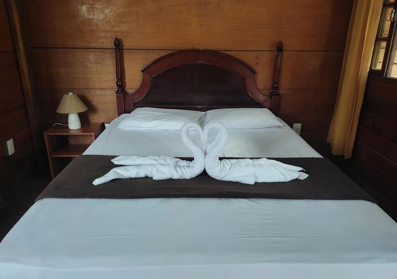 Bed in Acquamarine Park Hotel