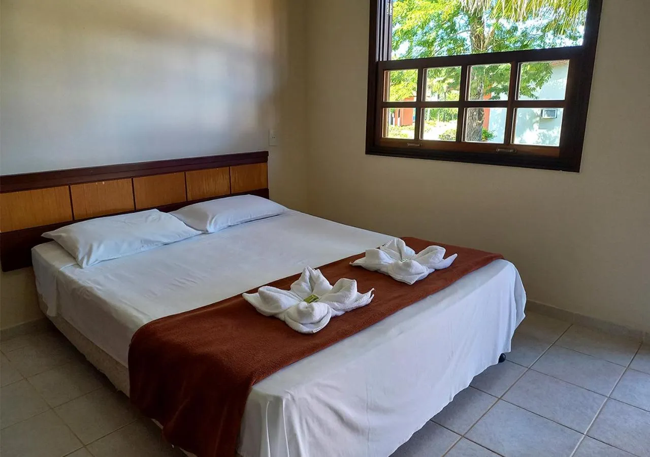 Bed in Acquamarine Park Hotel