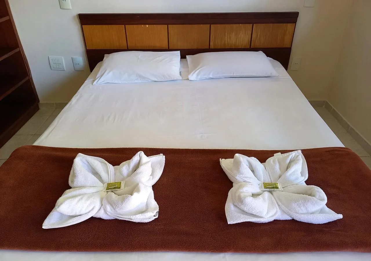 Bed in Acquamarine Park Hotel
