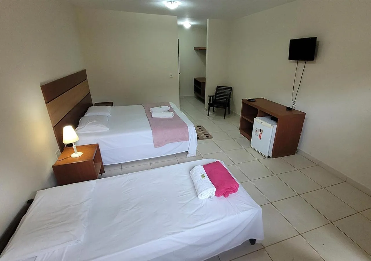 Bed in Acquamarine Park Hotel