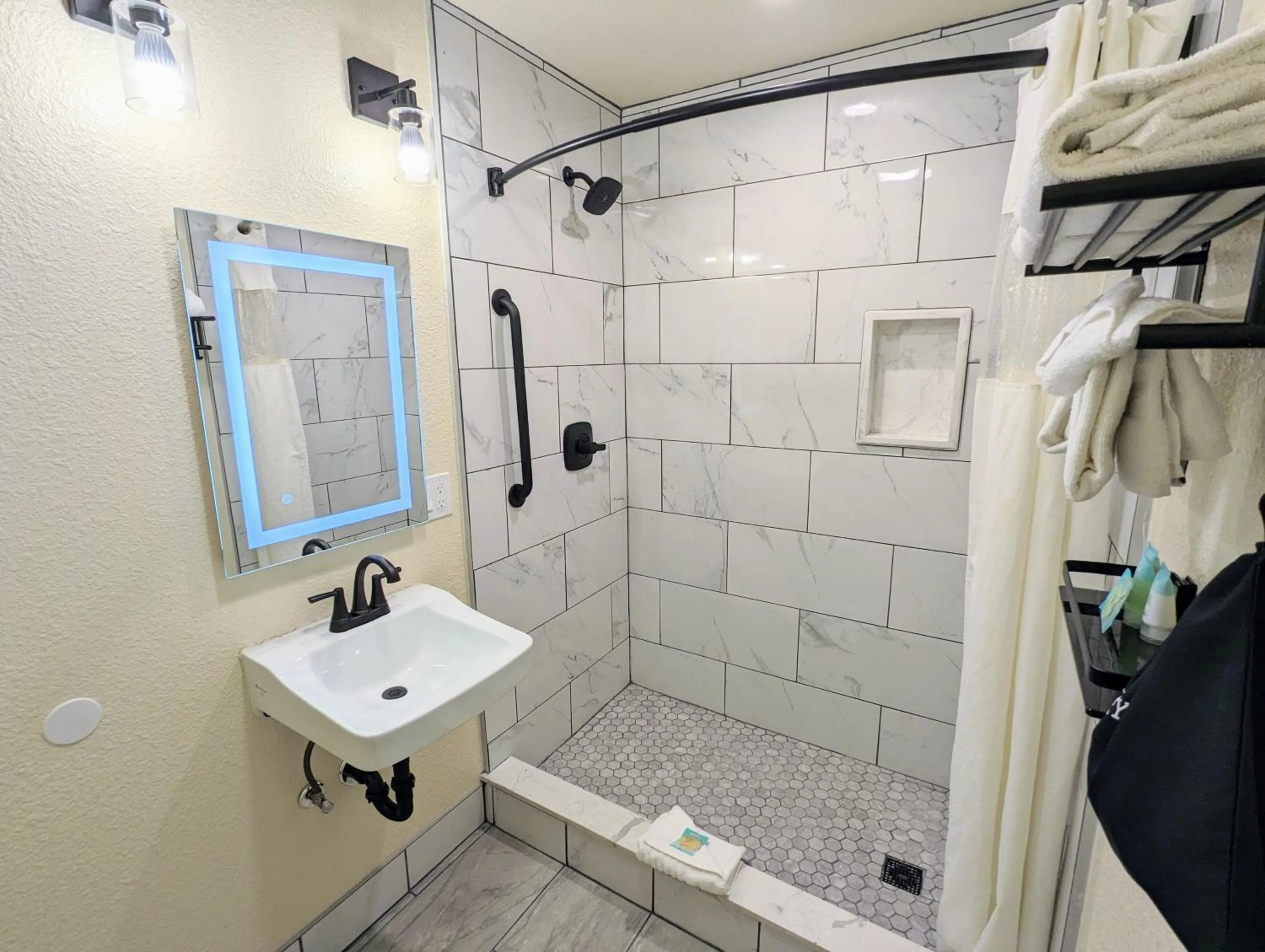 Bathroom in Clarion Collection Wilkie's Inn Pacific Grove - Monterey