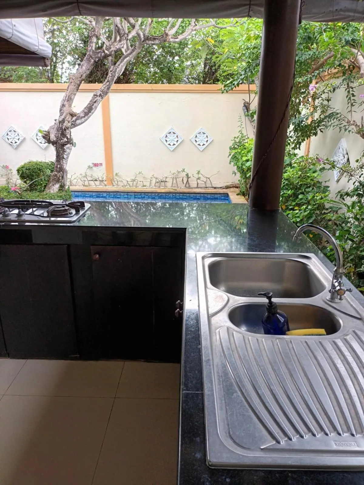 Kitchen or kitchenette in Heliconia Villa