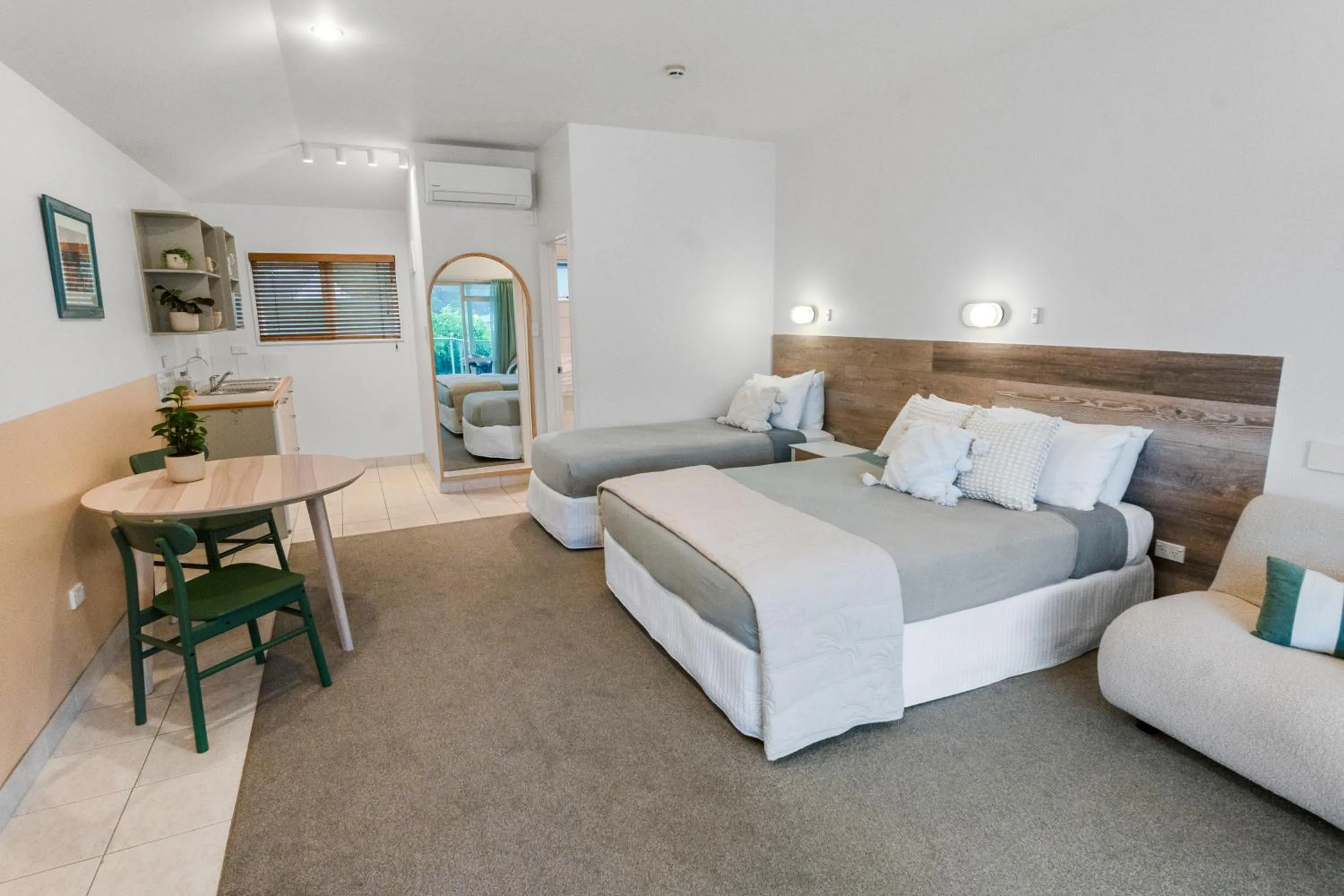 Bed in ASURE Admirals View Motel