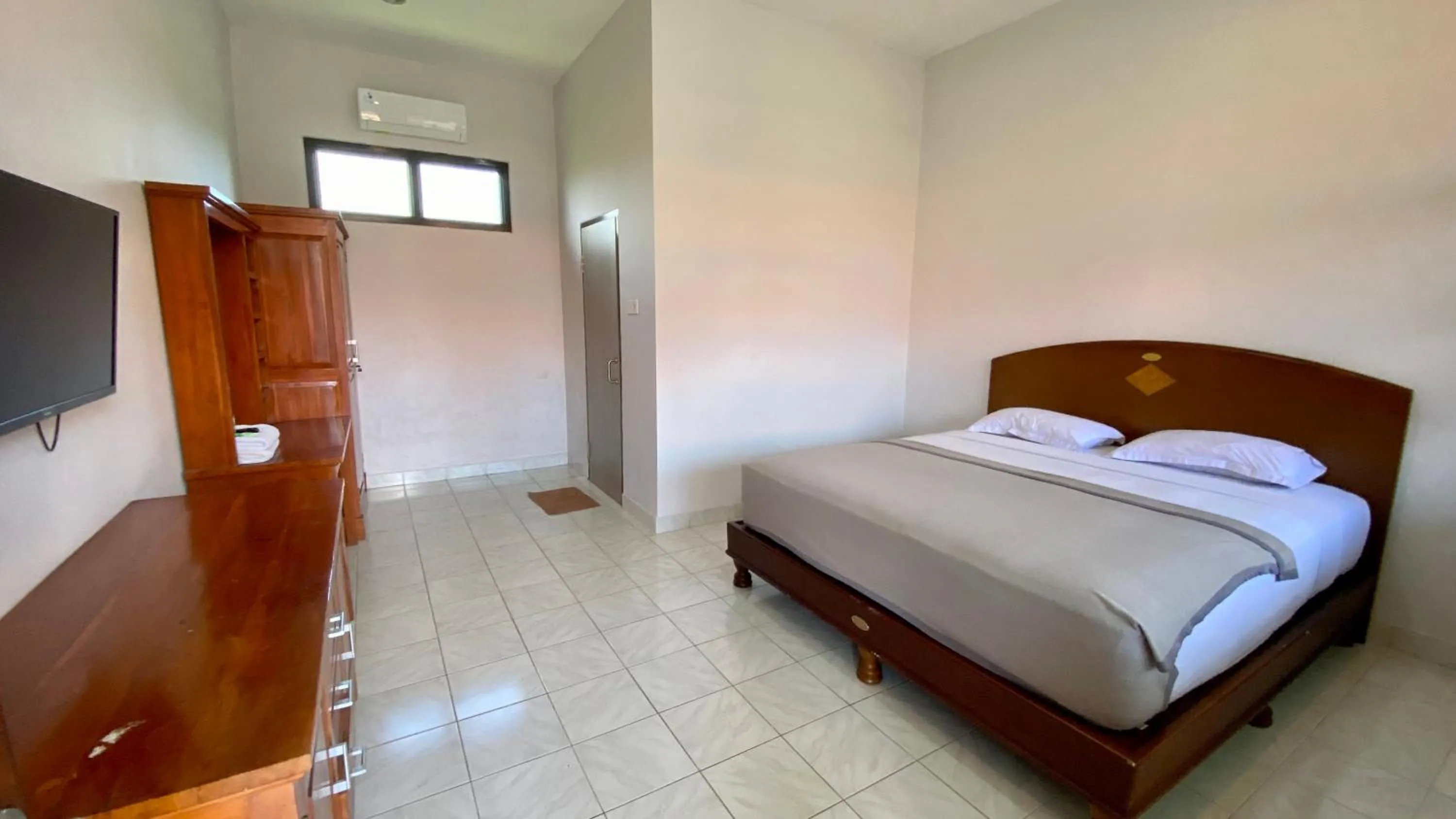 Bed in Simpang Inn Hotel