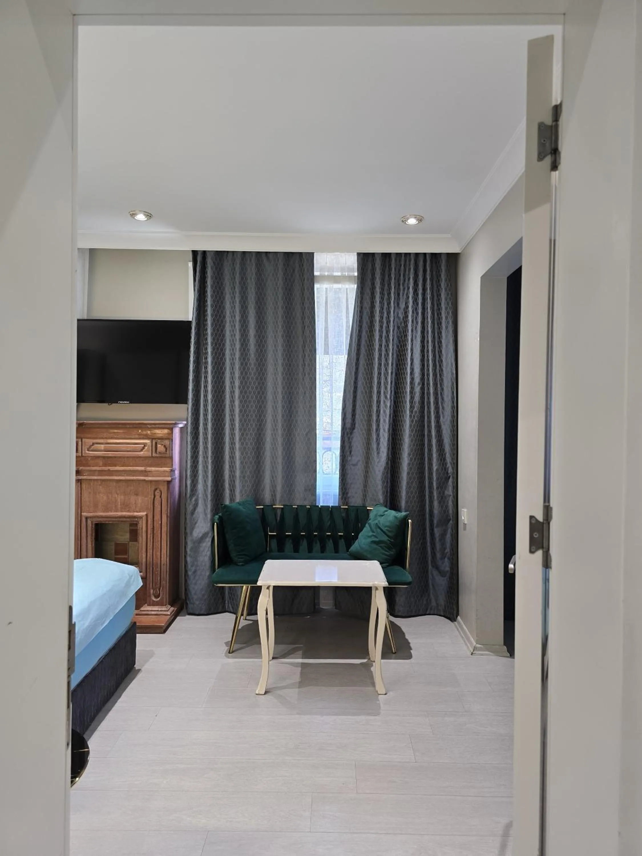 Seating area, Bed in The Empress Theodora Hotel ll