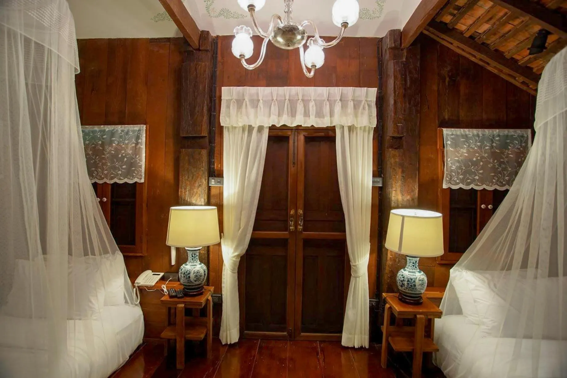 Bed in Chantra Khiri Chalet Chiang Mai