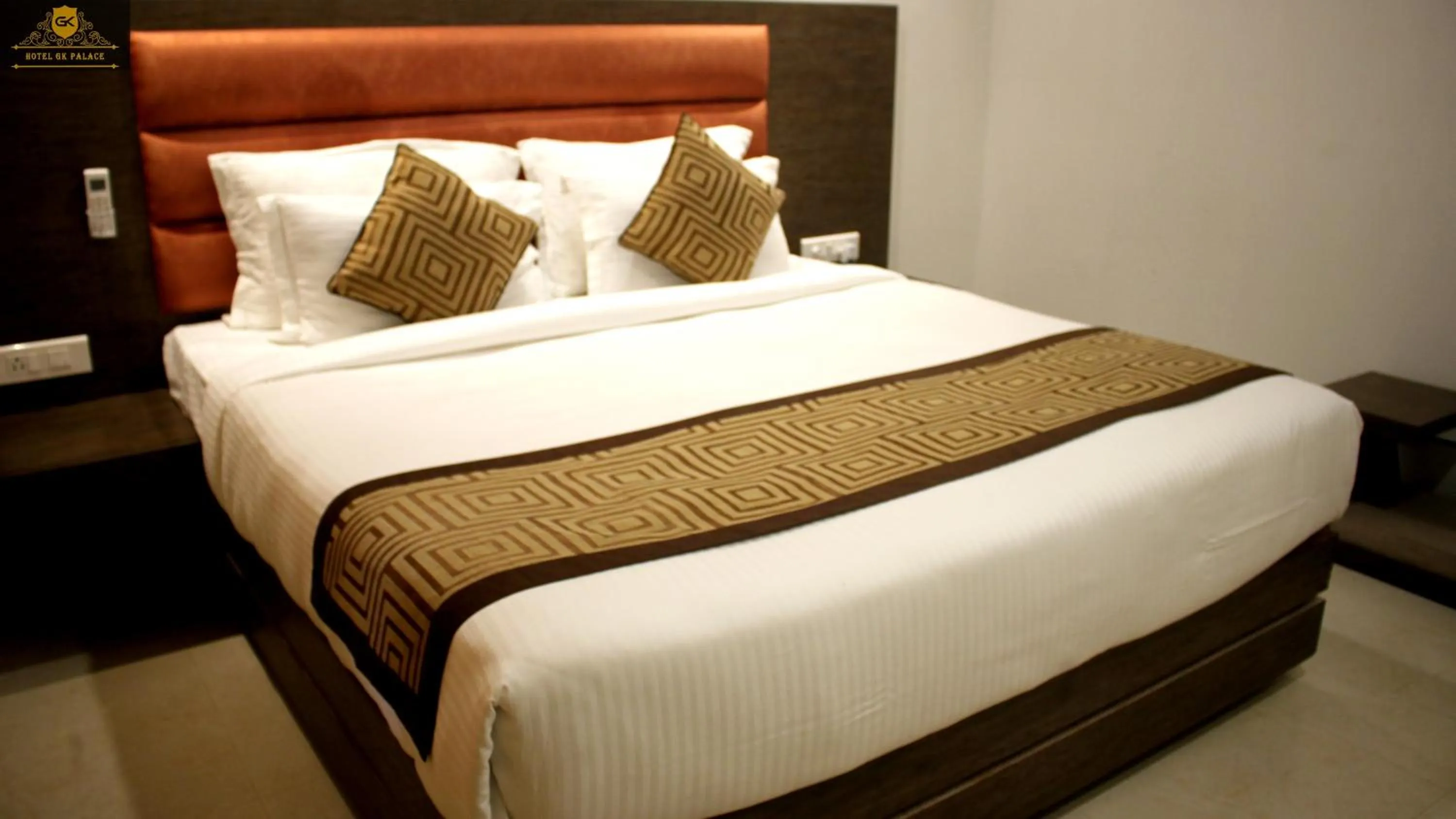 Bed in GK PALACE Pure VEG Hotel