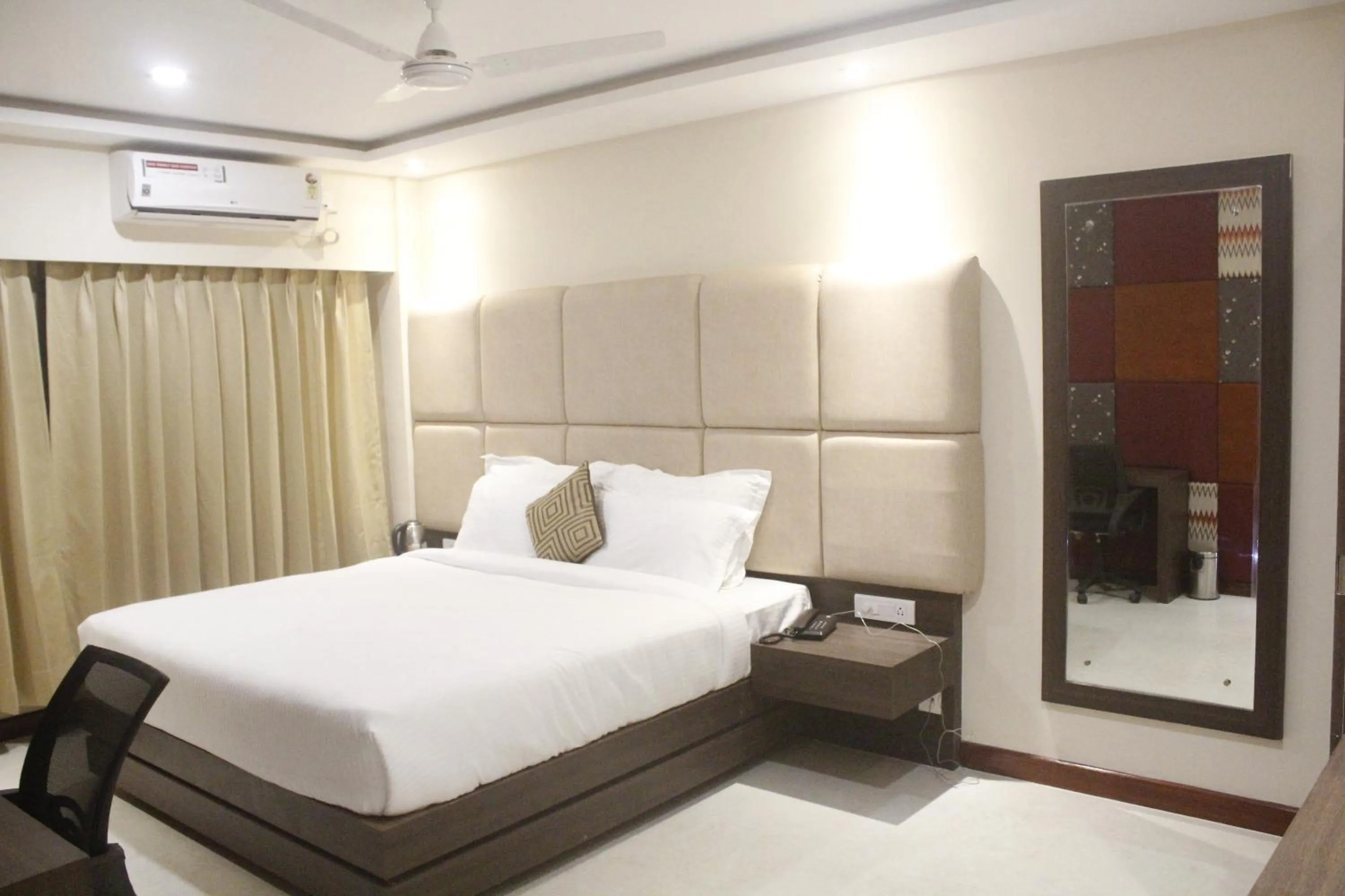 Bed in GK PALACE Pure VEG Hotel