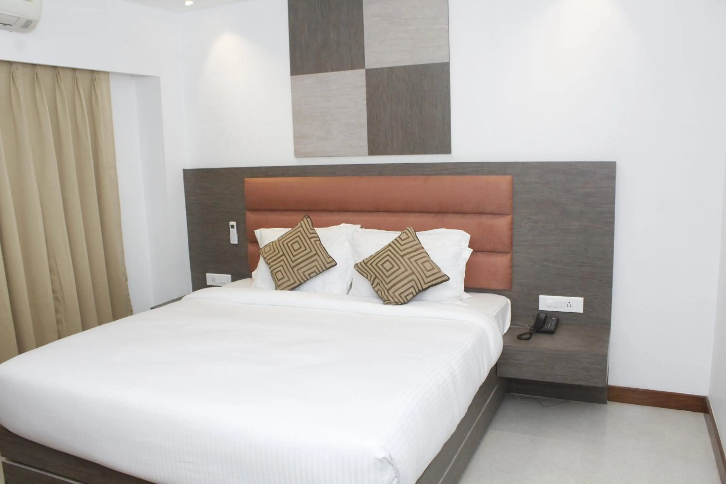 Bed in GK PALACE Pure VEG Hotel