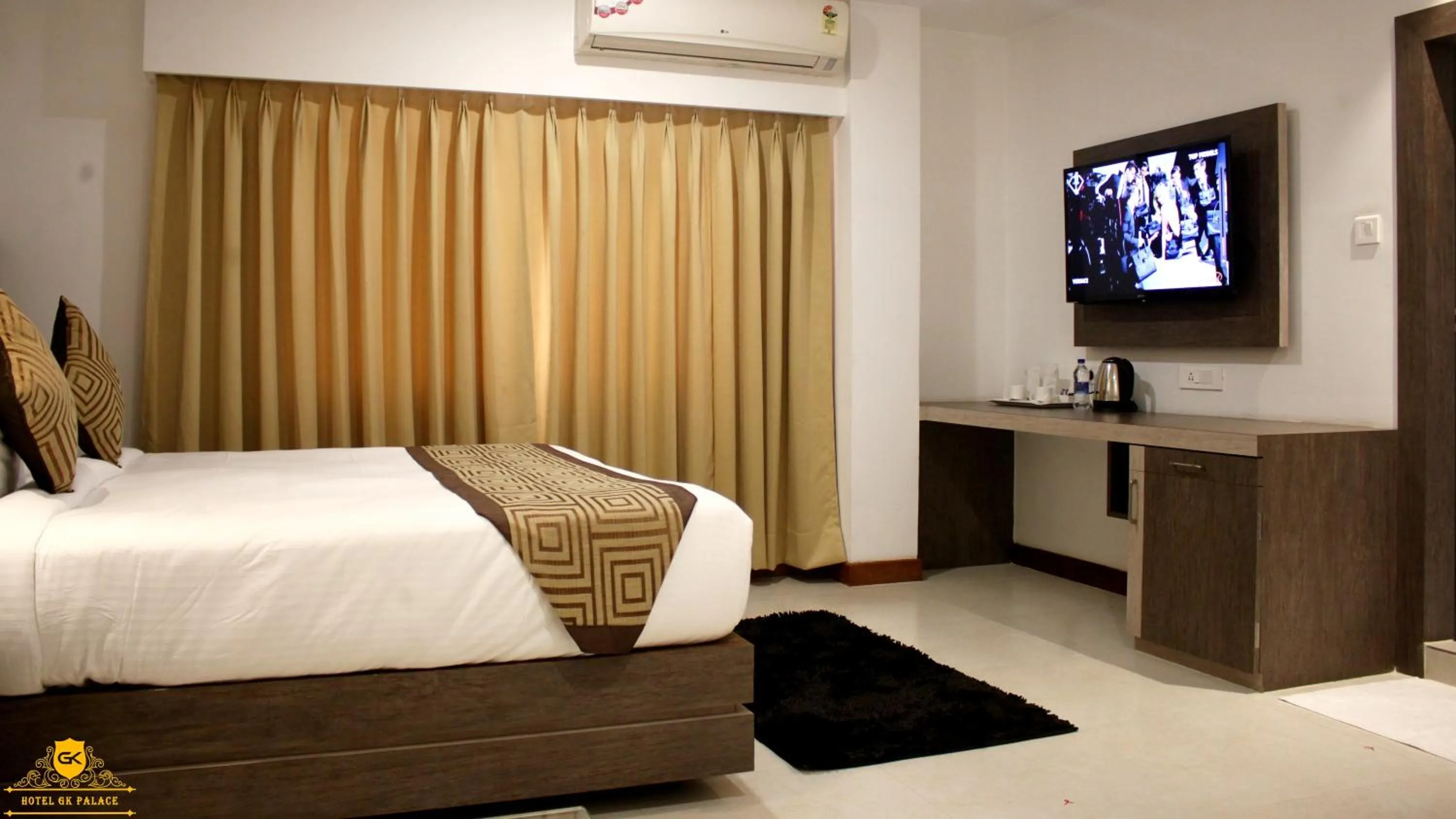 Bed in GK PALACE Pure VEG Hotel