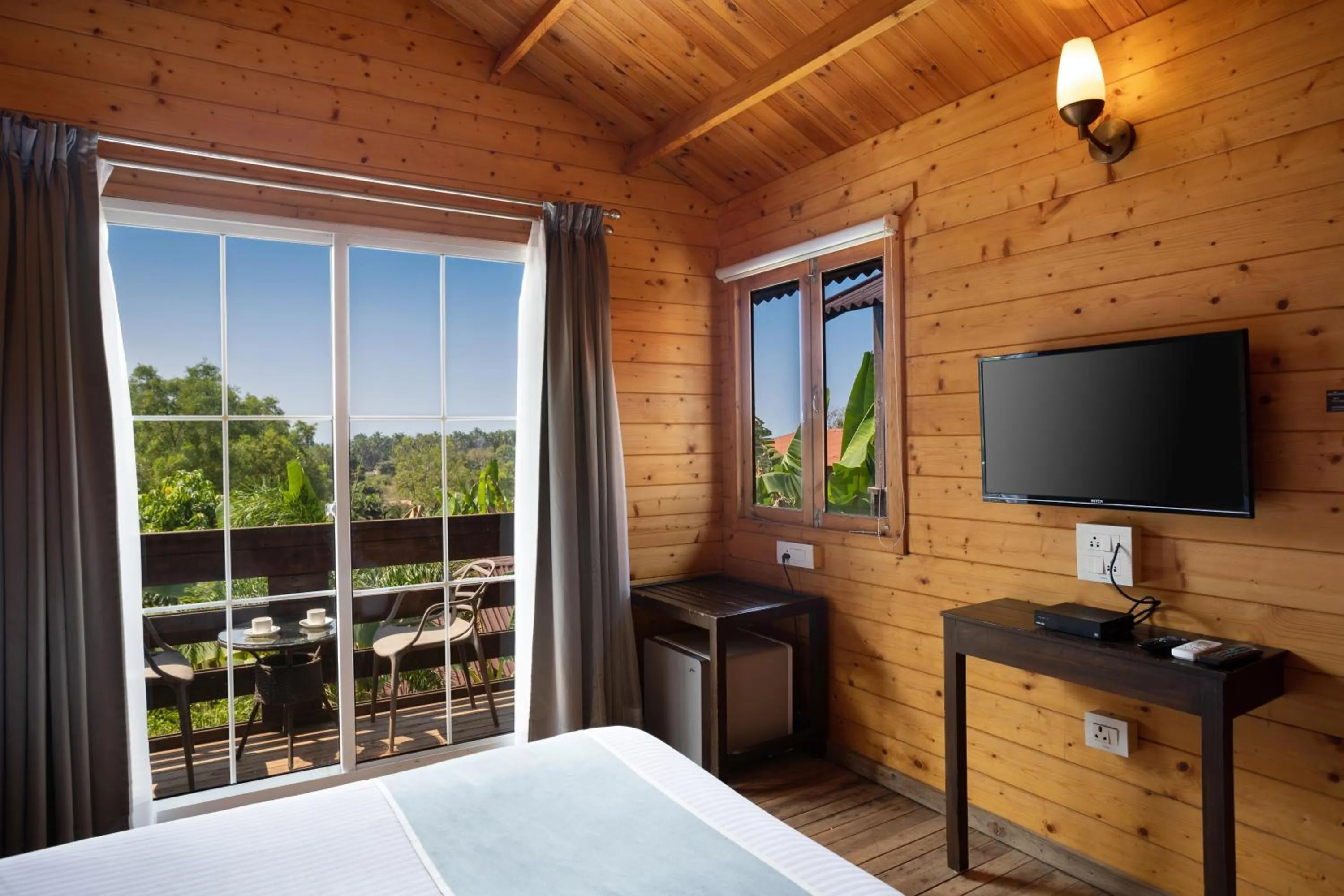 Bedroom, Bed in White Wood Resort By Stone Wood Hotels