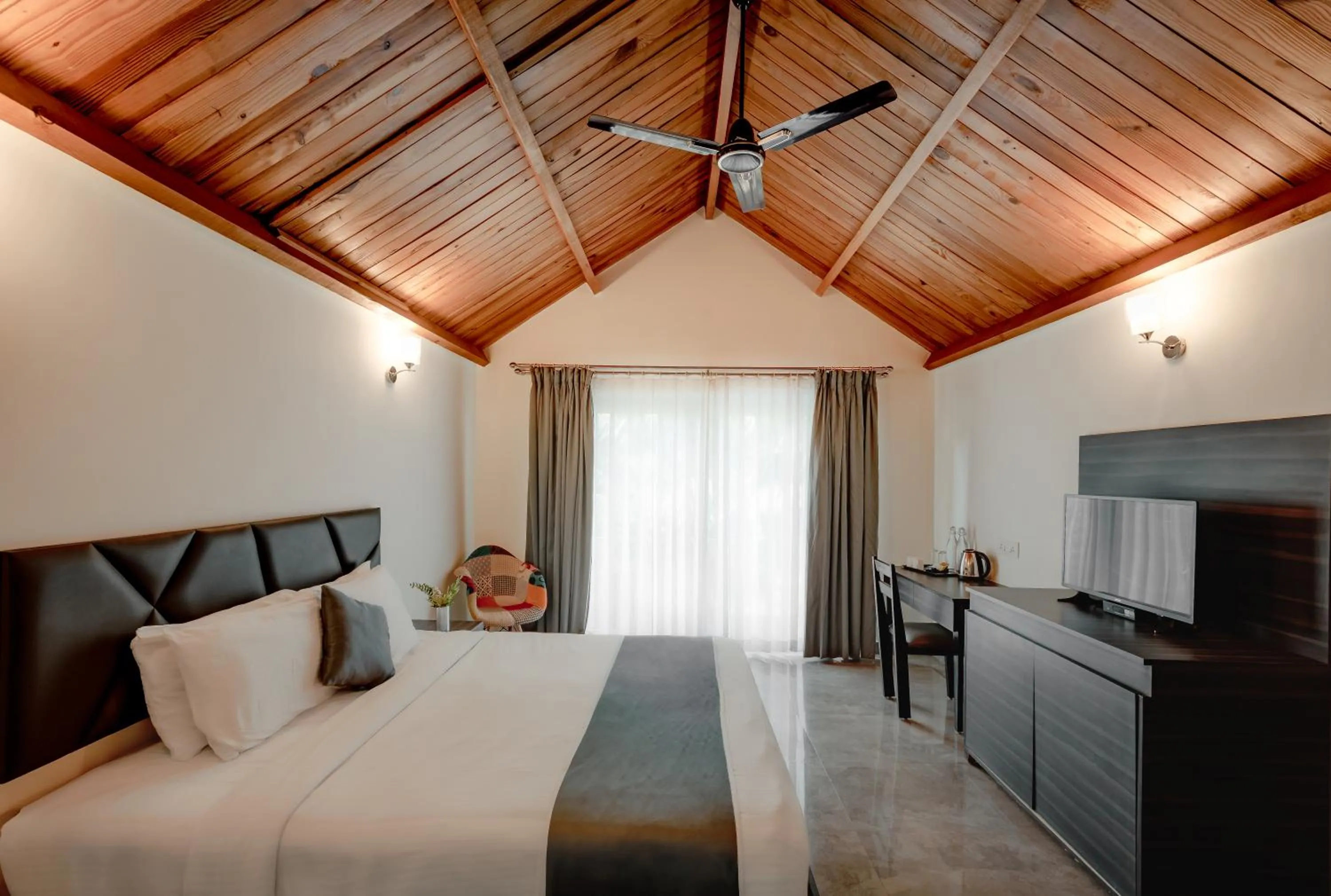 Bed in White Wood Resort By Stone Wood Hotels