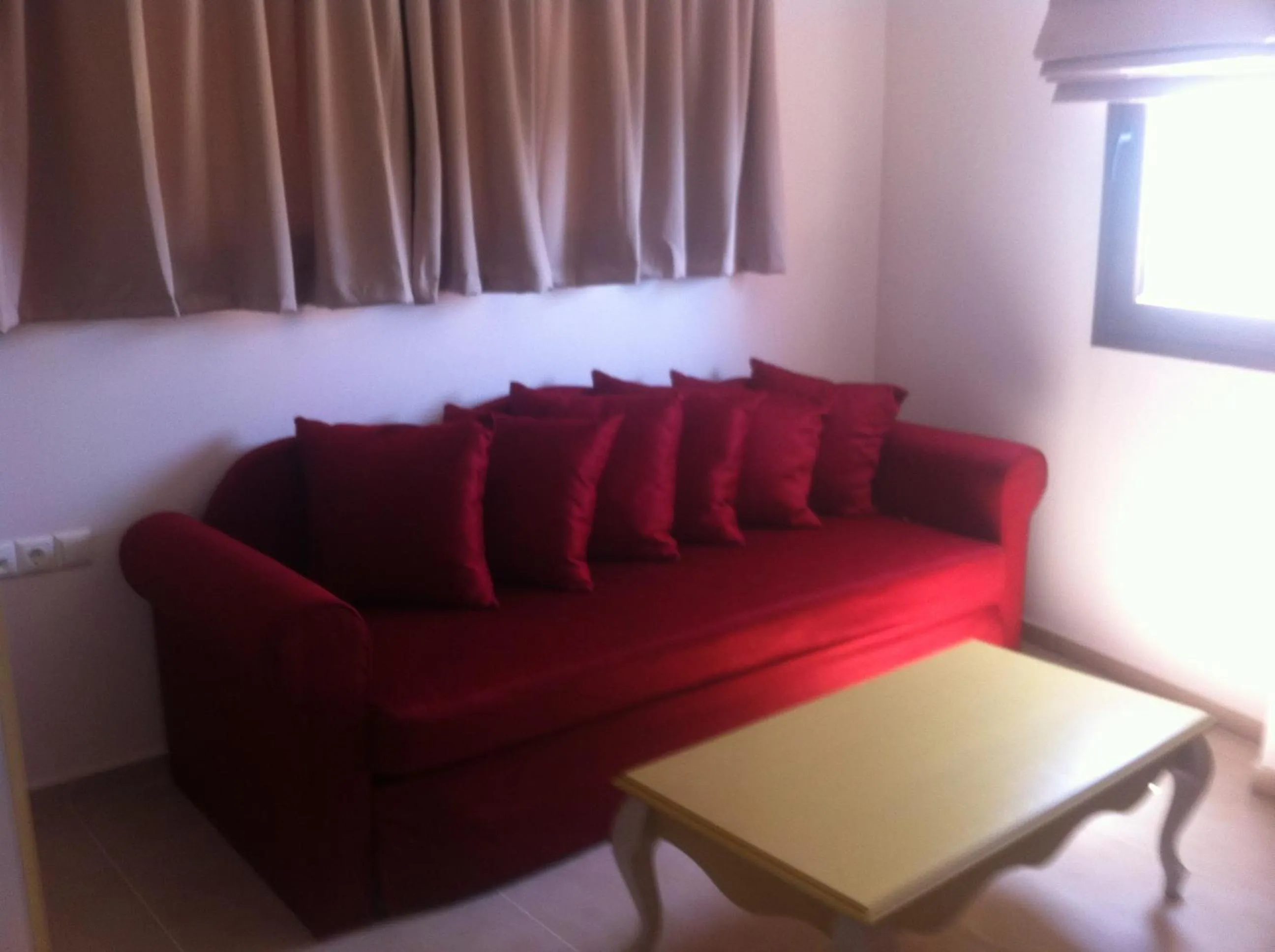 Living room in Palatino Hotel