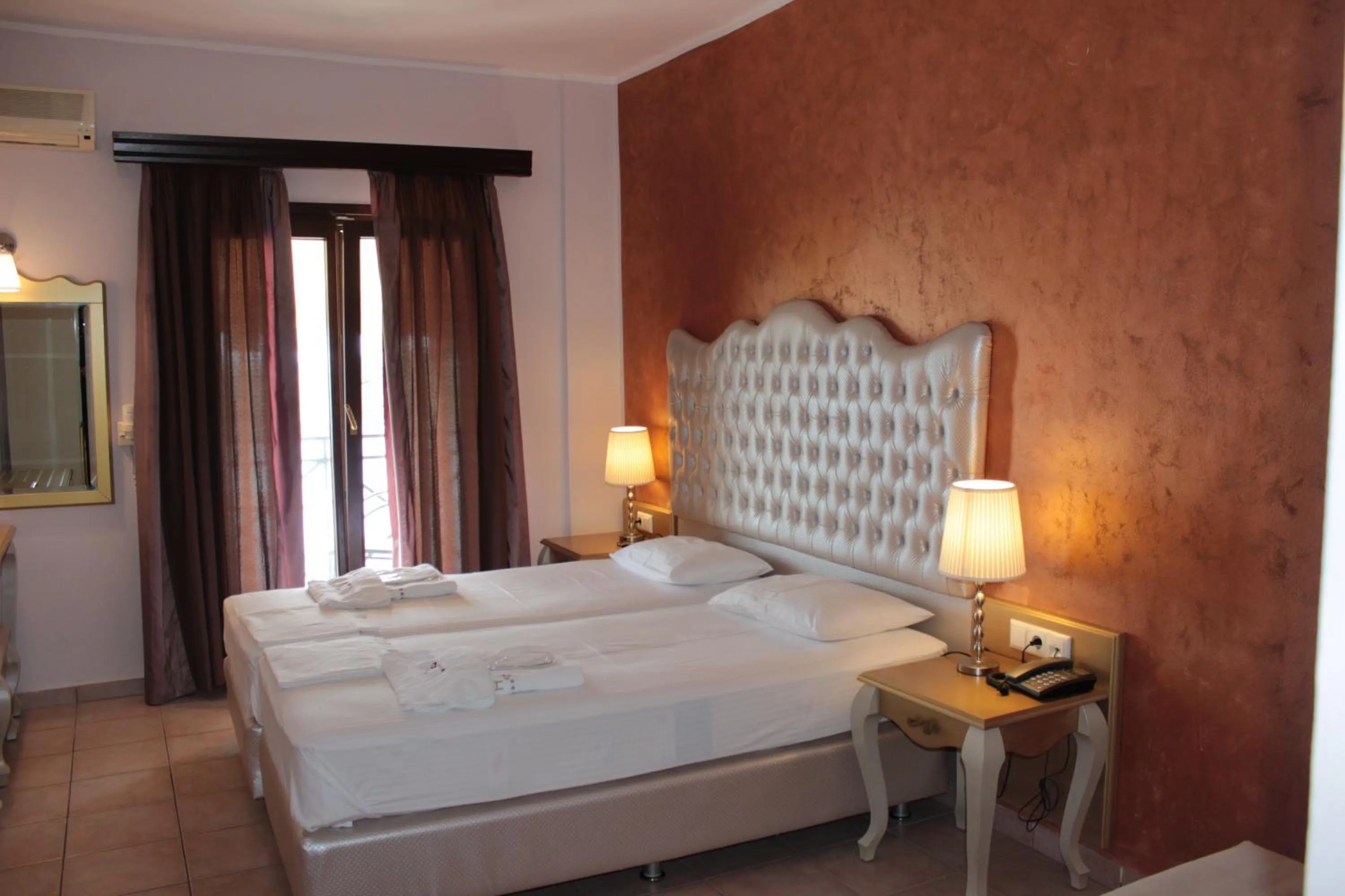 Bedroom in Palatino Hotel