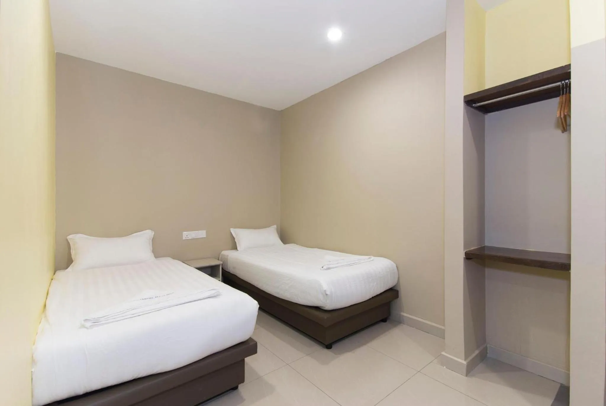 Bed in Hotel Raja Bot