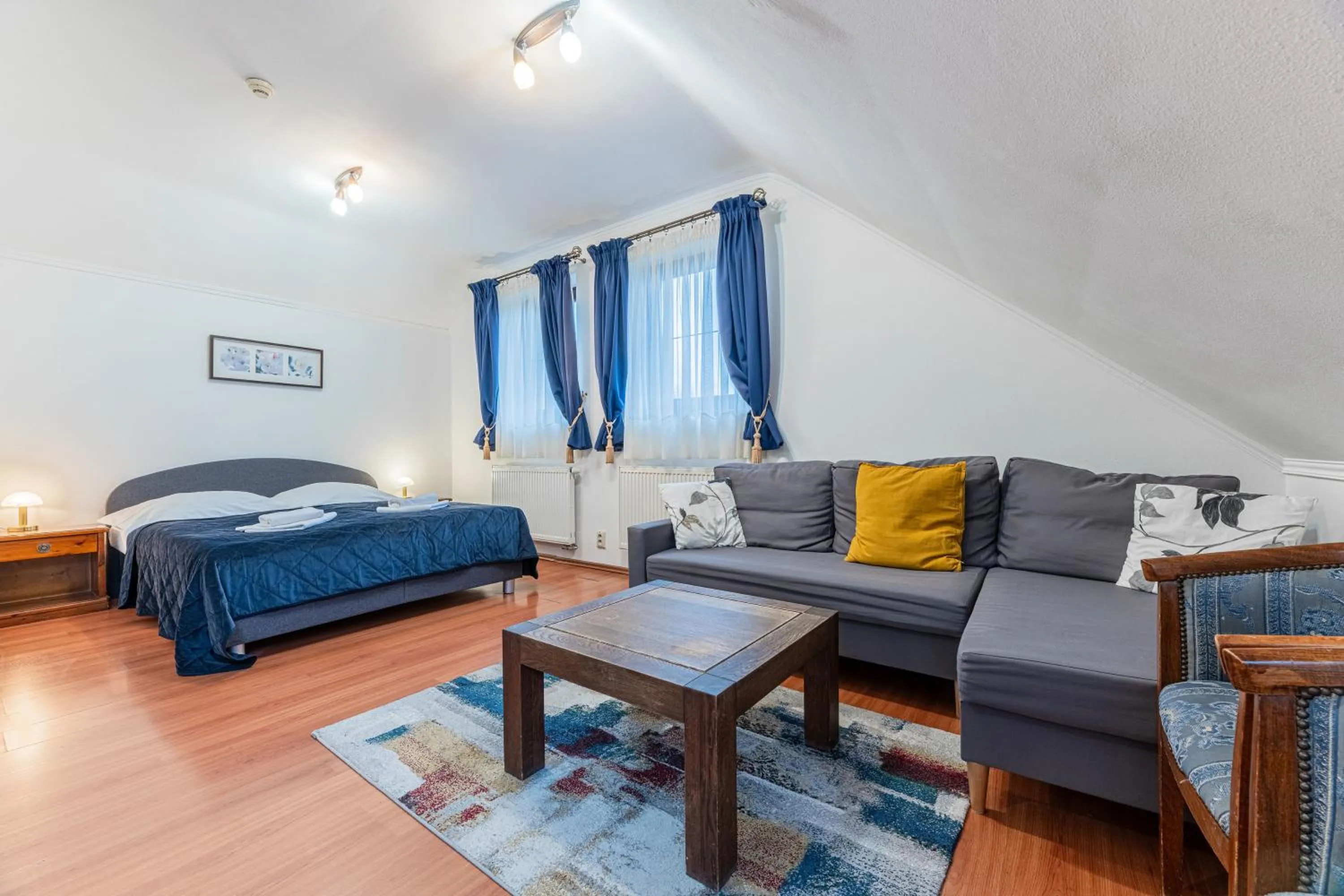 Living room, Bed in Hotel Amalia