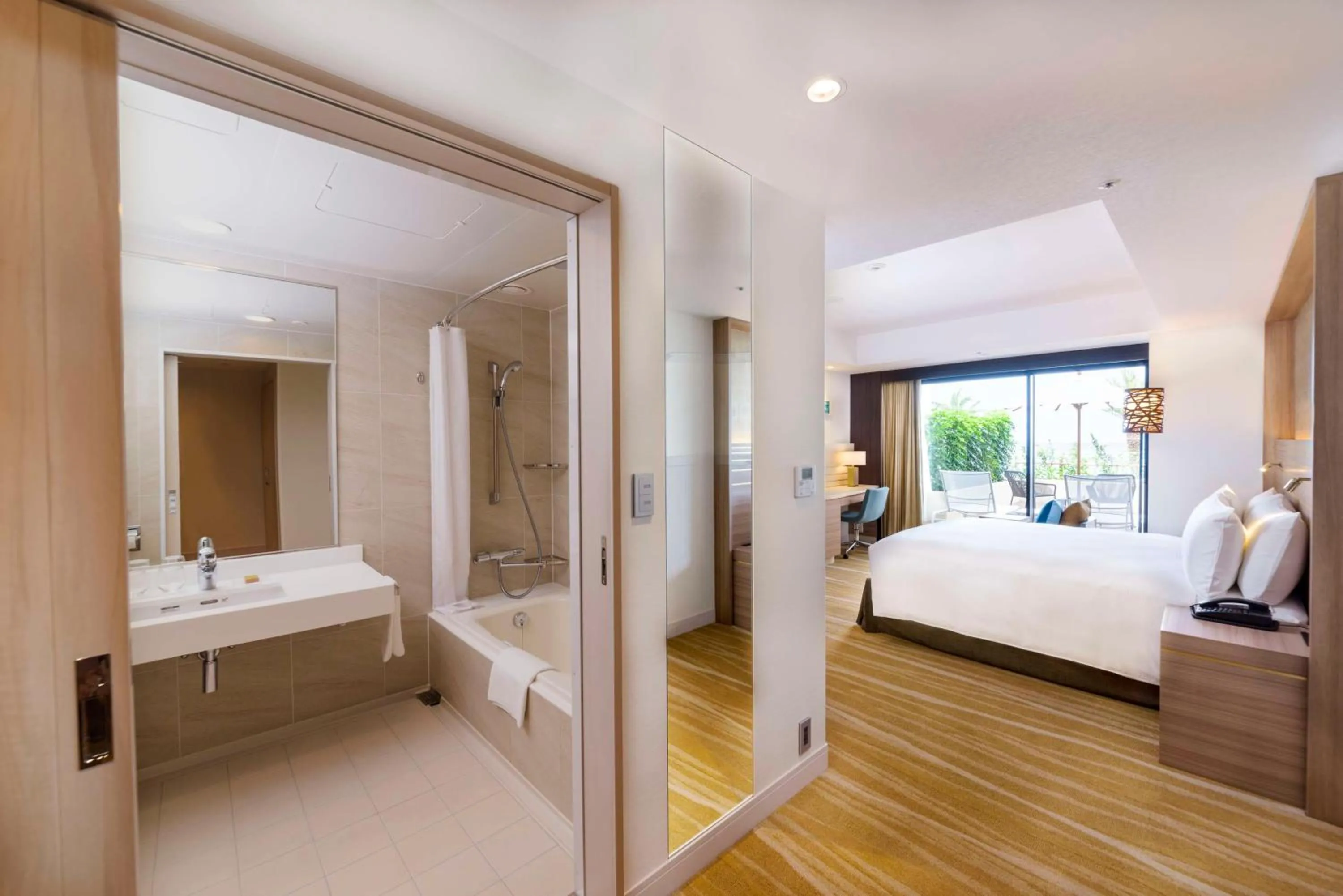 Bathroom, Bed in DoubleTree by Hilton Okinawa Chatan Resort