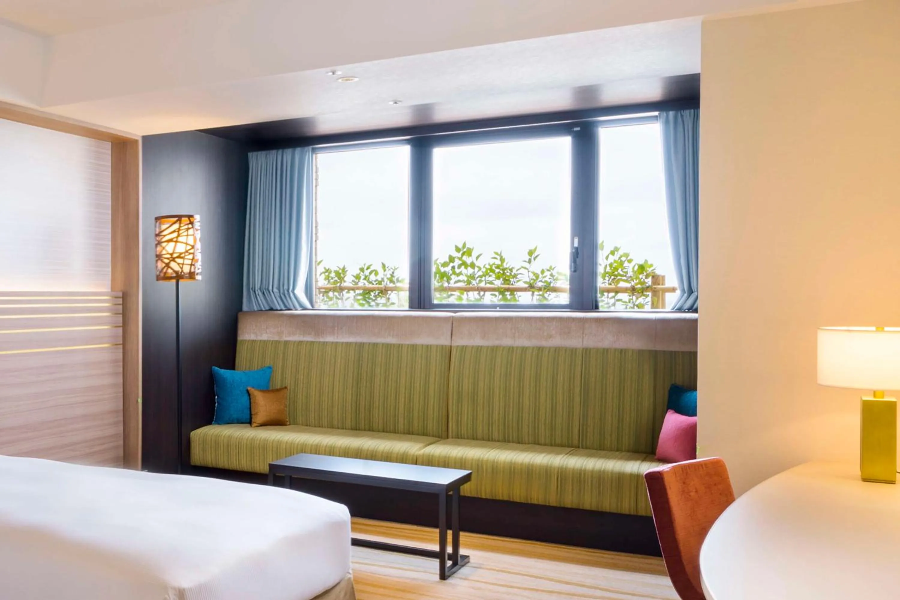 Living room, Bed in DoubleTree by Hilton Okinawa Chatan Resort