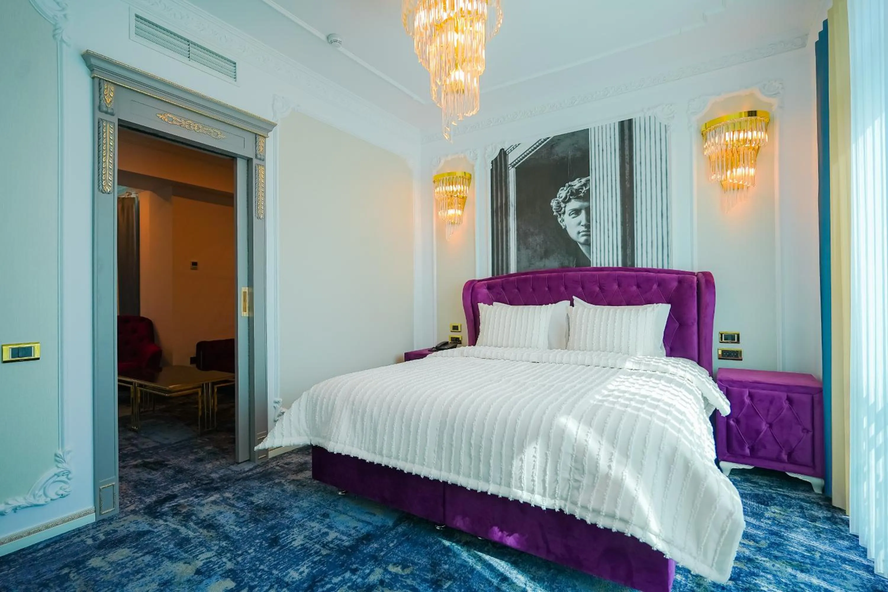 Bed in W Regal Boutique Hotel&Spa