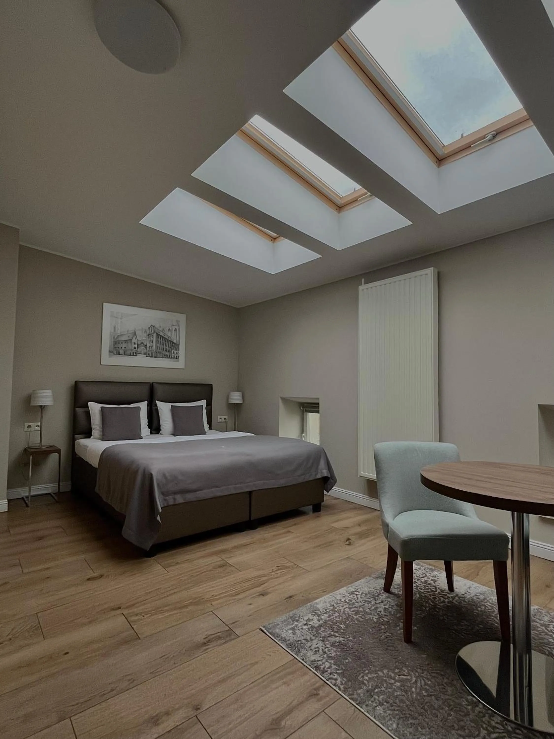 Bed in Joyinn Aparthotel