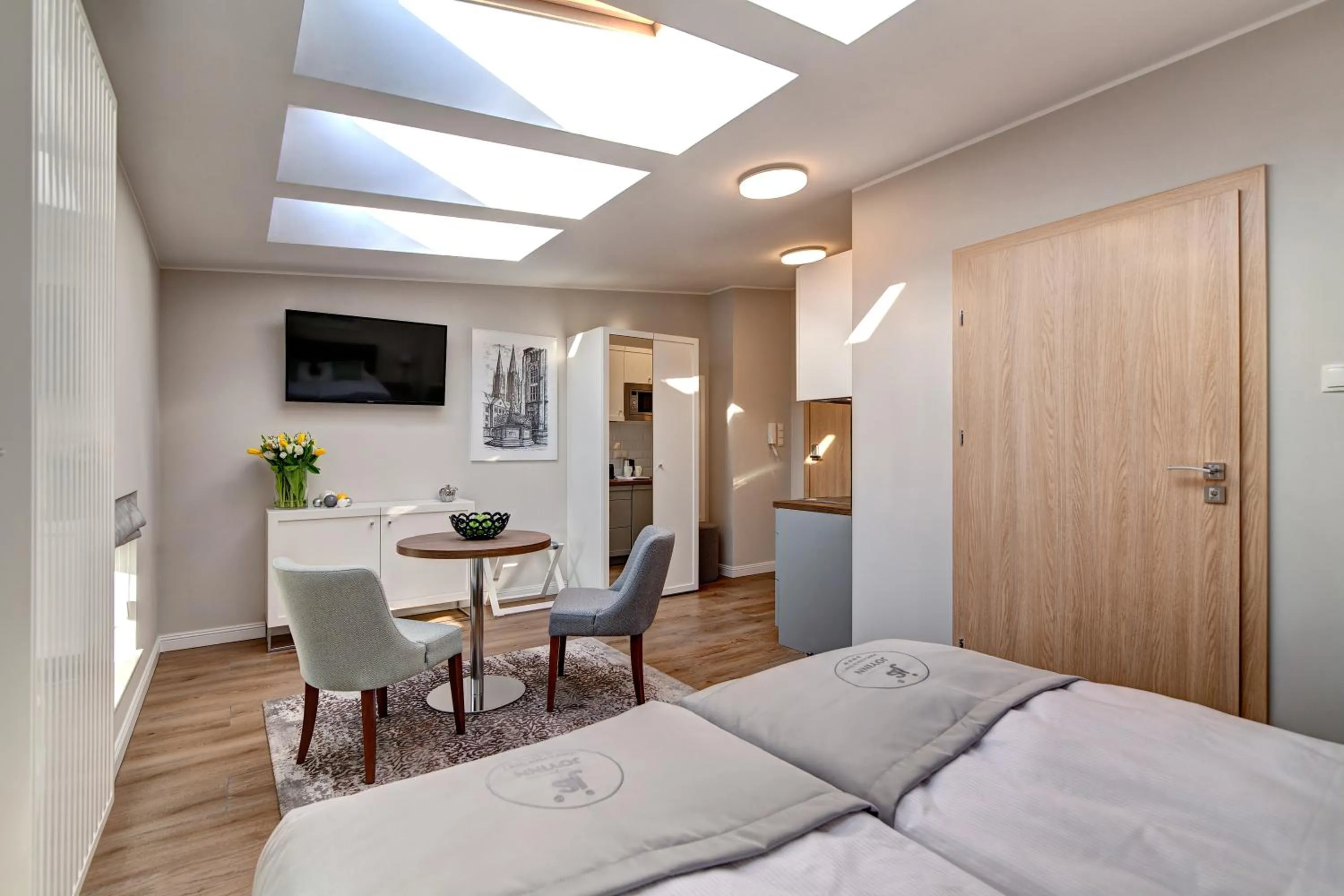 Bed in Joyinn Aparthotel