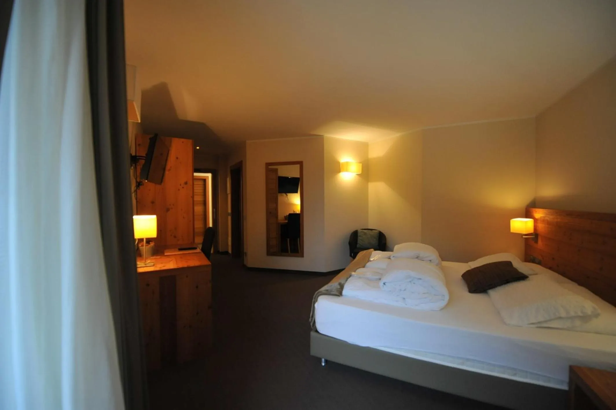 Bed in Bio Hotel Brusago Vital & Wellness