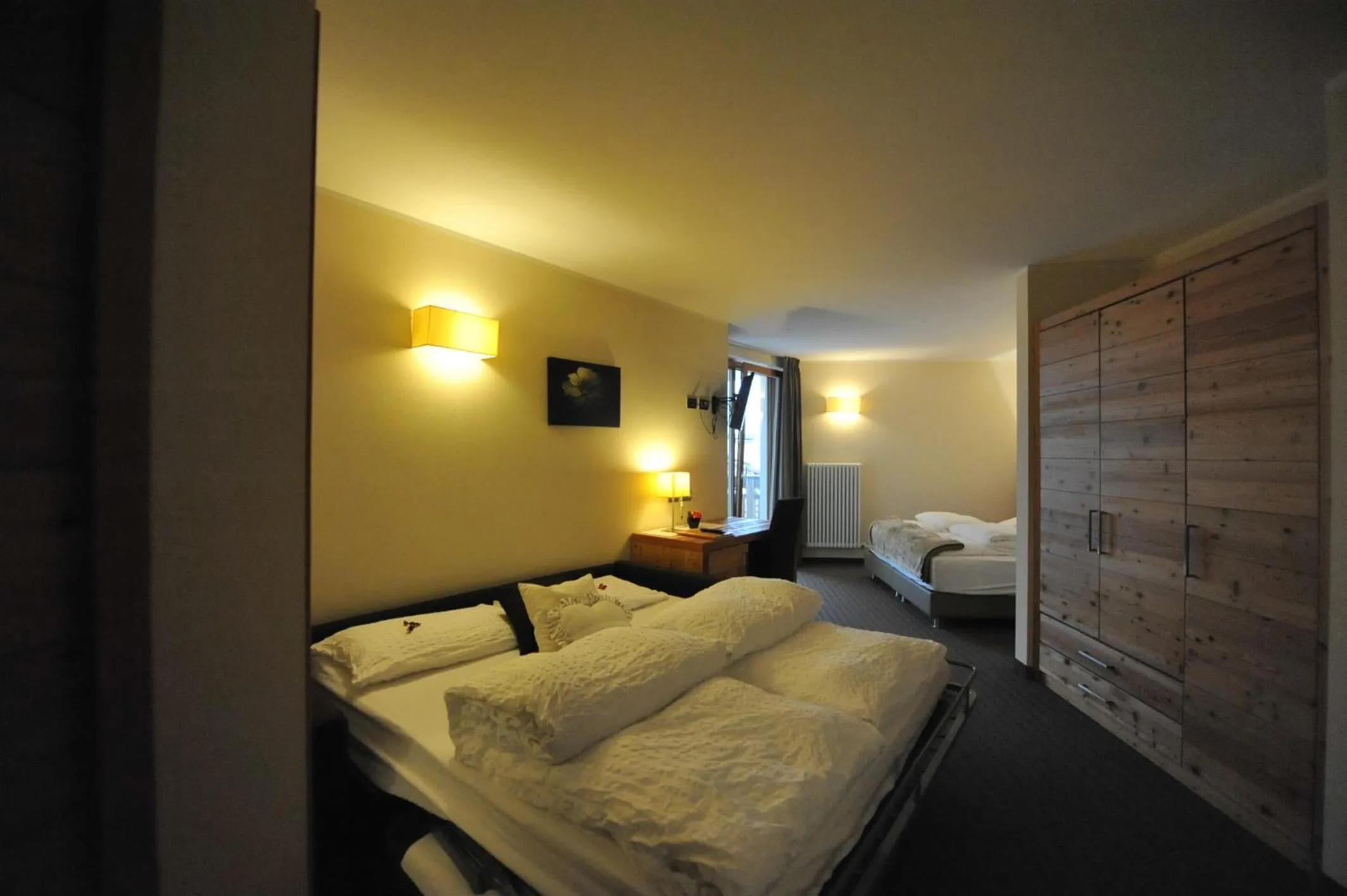 Bed in Bio Hotel Brusago Vital & Wellness
