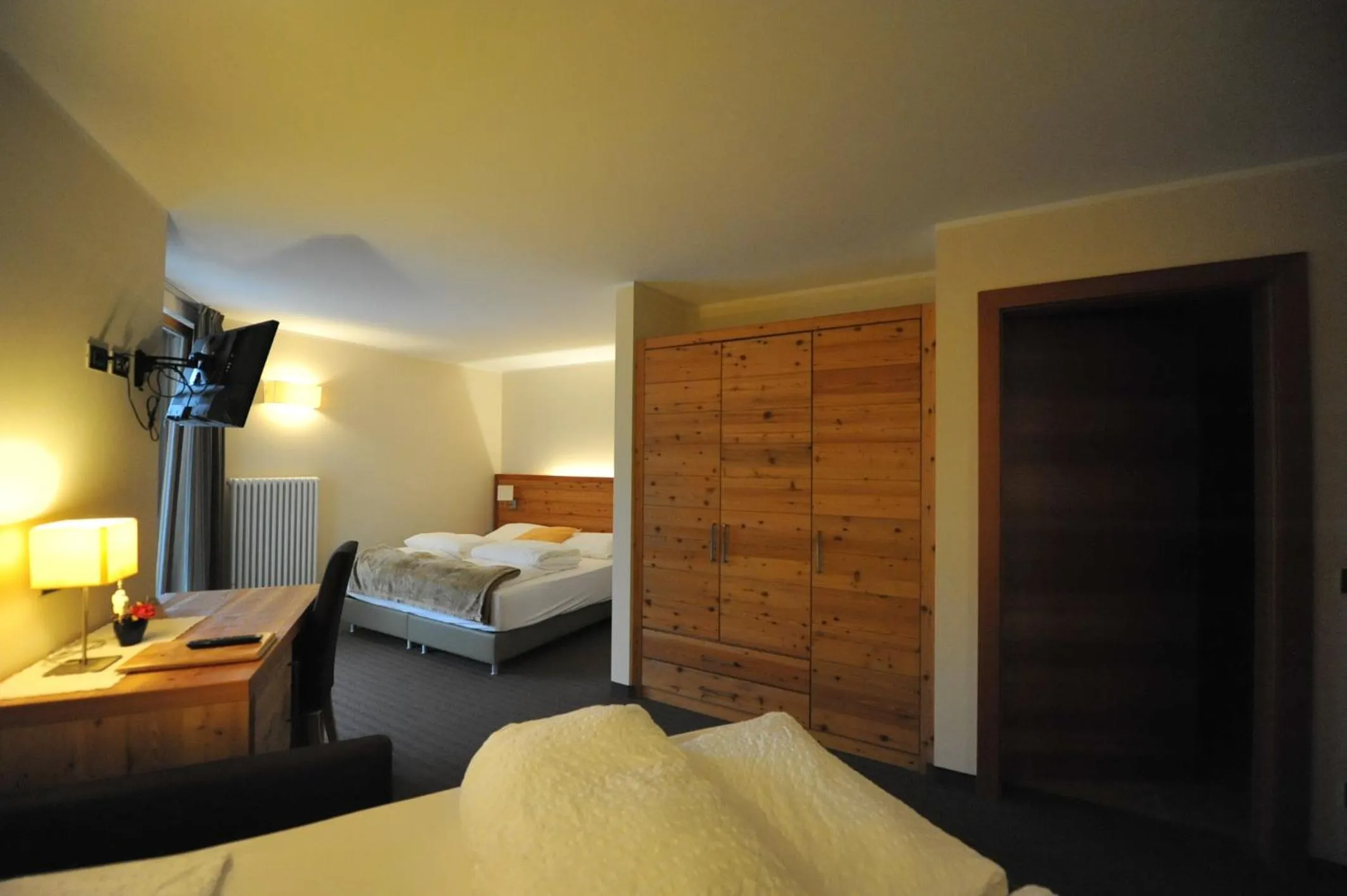 Bed in Bio Hotel Brusago Vital & Wellness