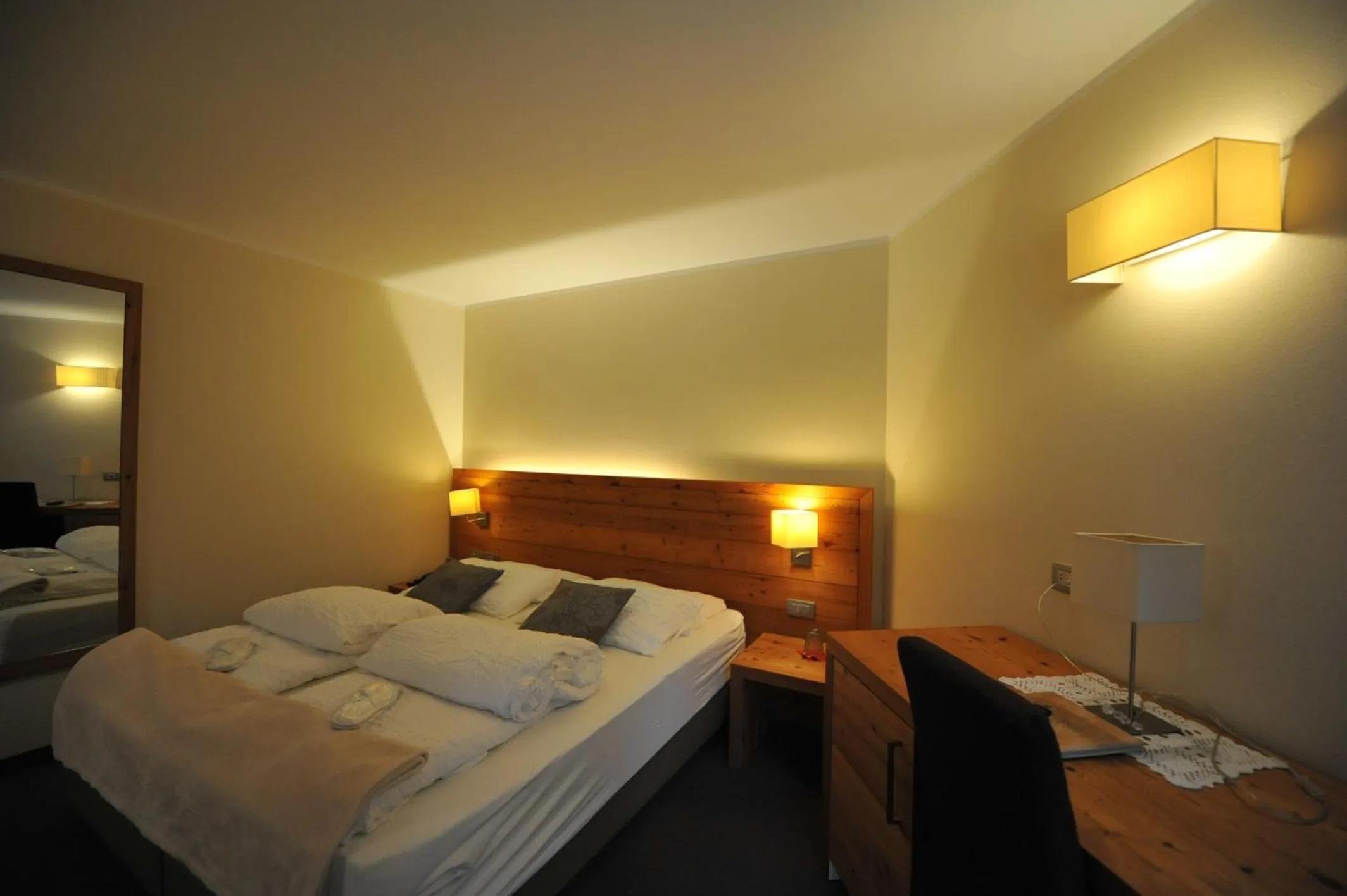 Bed in Bio Hotel Brusago Vital & Wellness