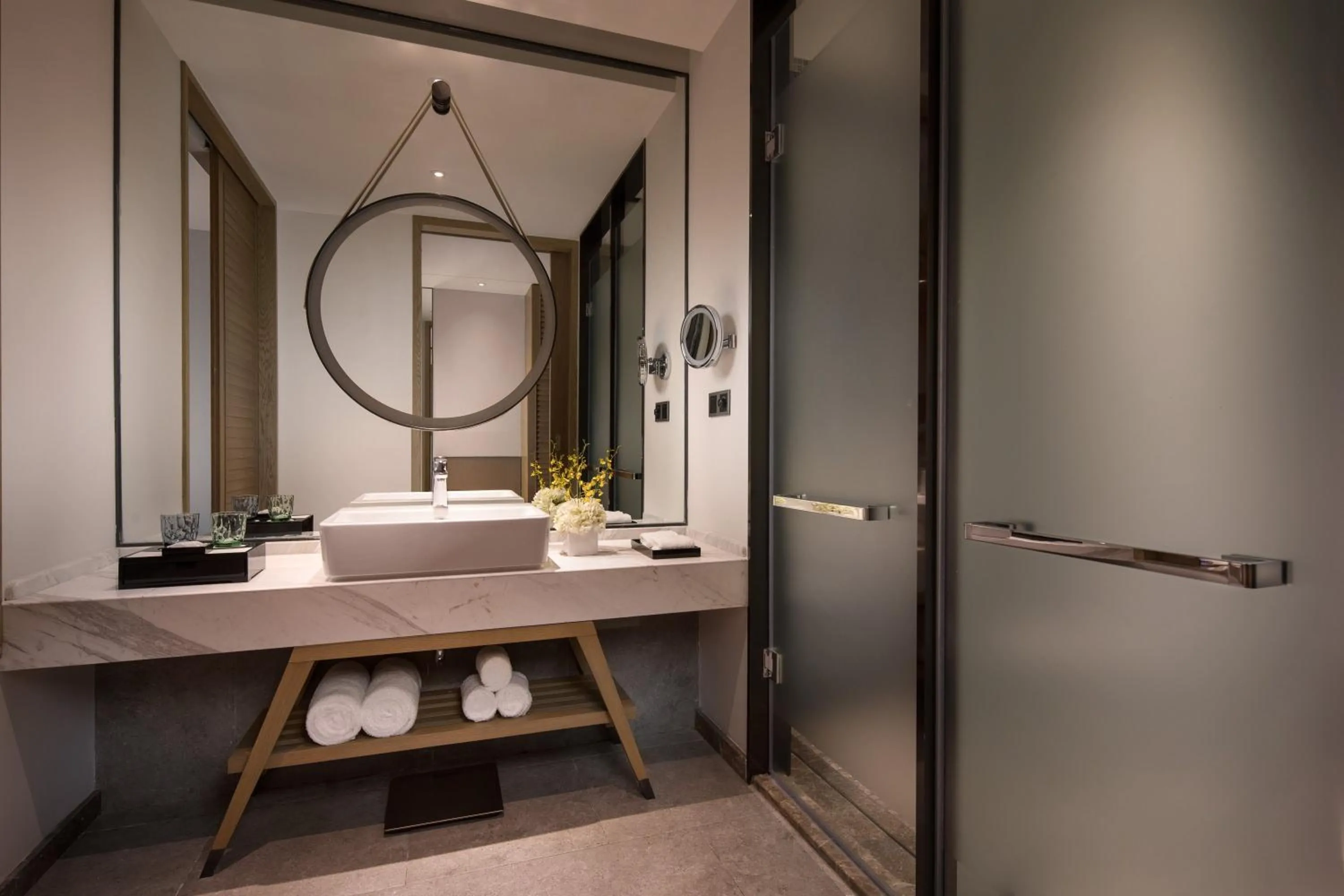 Bathroom in Crowne Plaza QingdaoOriental Movie Metropolis by IHG