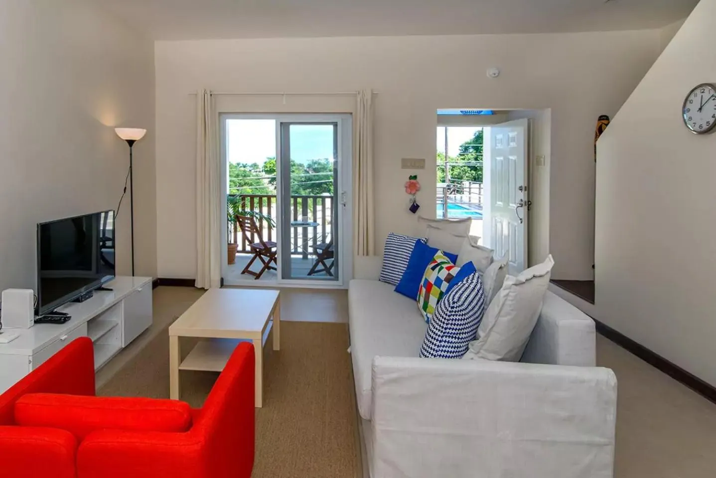 Communal lounge/ TV room in Luxury 2BR Home facing Beach w/Pool Montego Bay #4