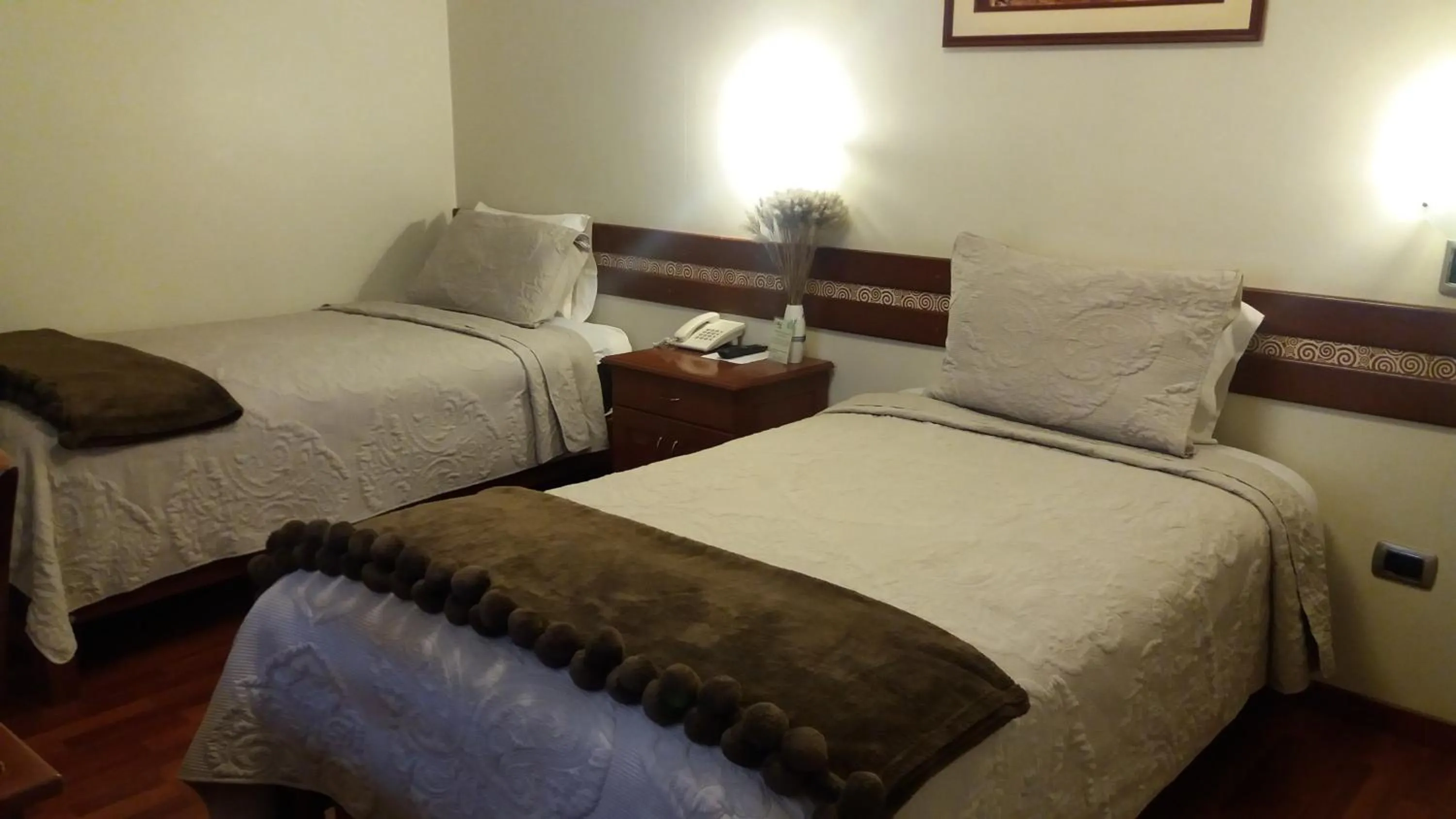 Bed in Antawasi Hotel