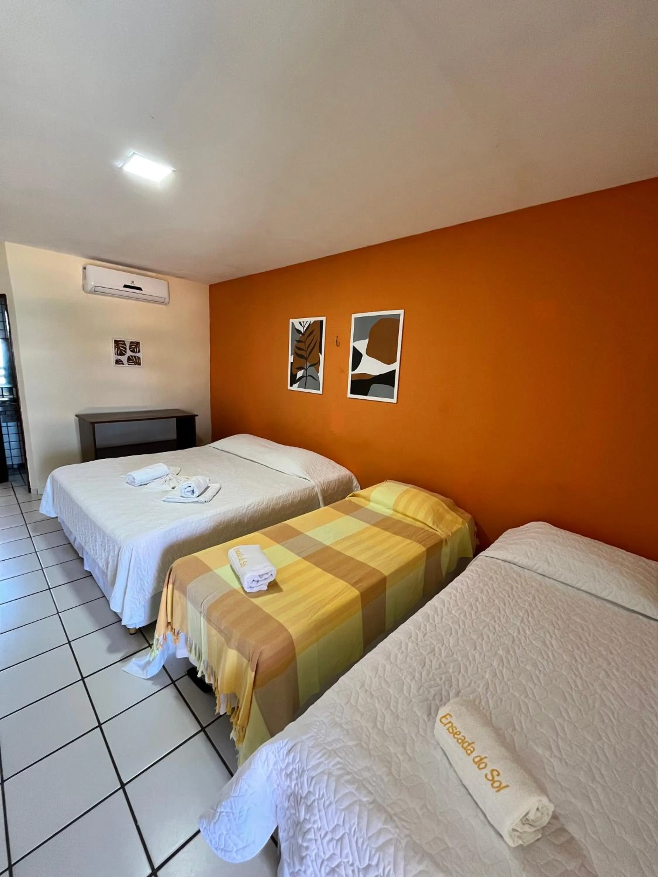 Bed in Pousada Enseada do Sol