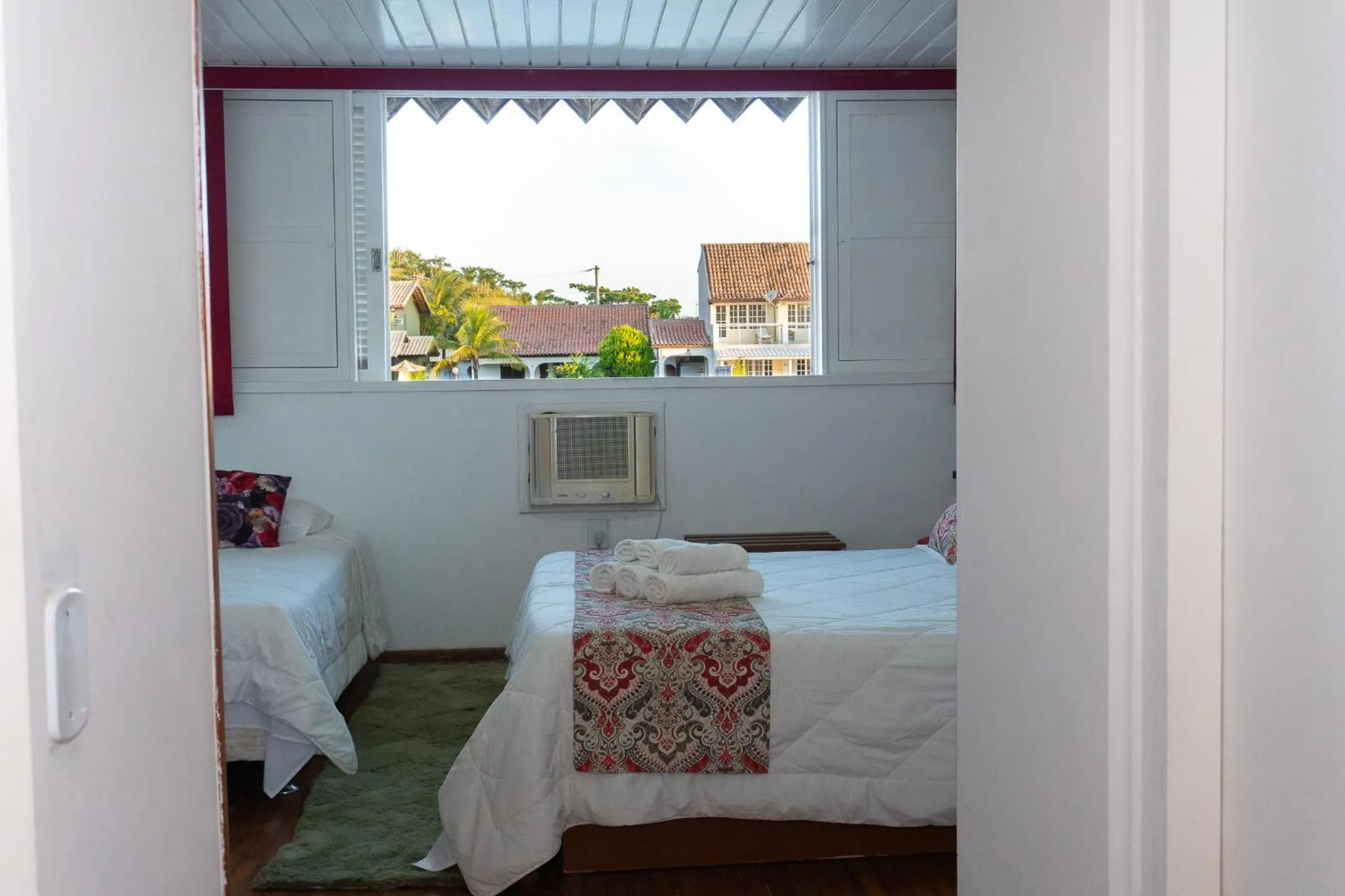 Bed in Pousada Marilia