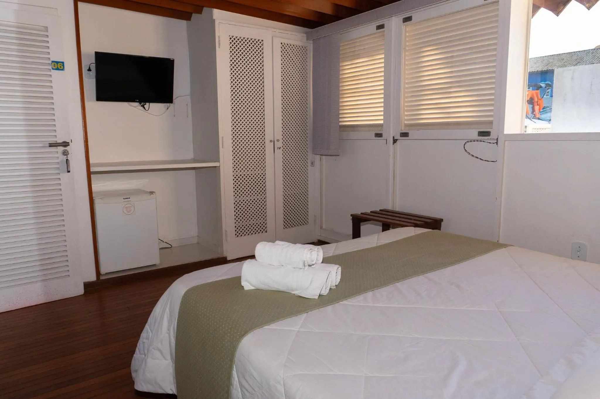 Bed in Pousada Marilia